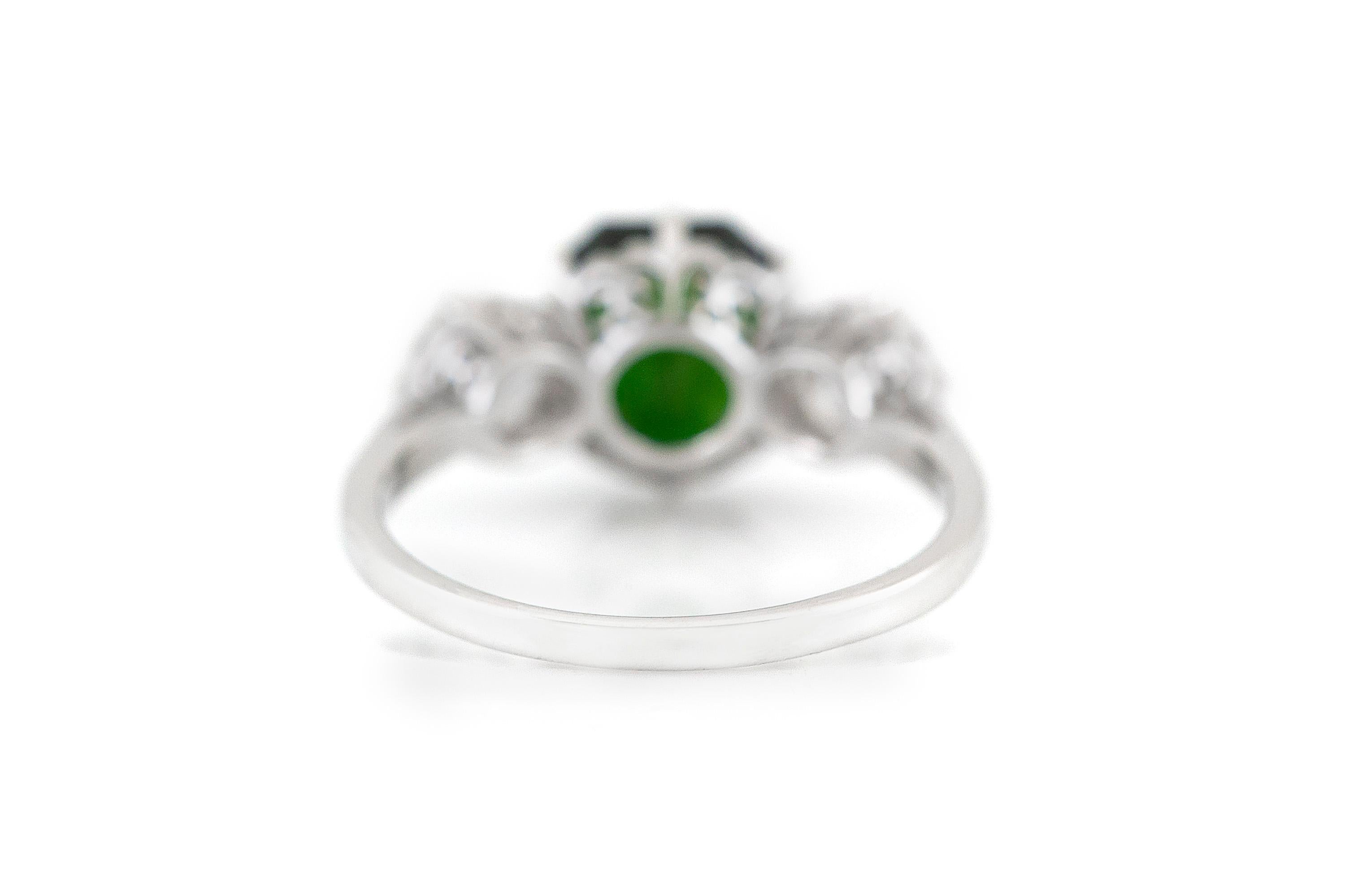 The ring is finely crafted in 18k white gold with green tourmaline weighing approximately total of 1.94 carat and diamonds weighing approximately total of 0.82 carat.