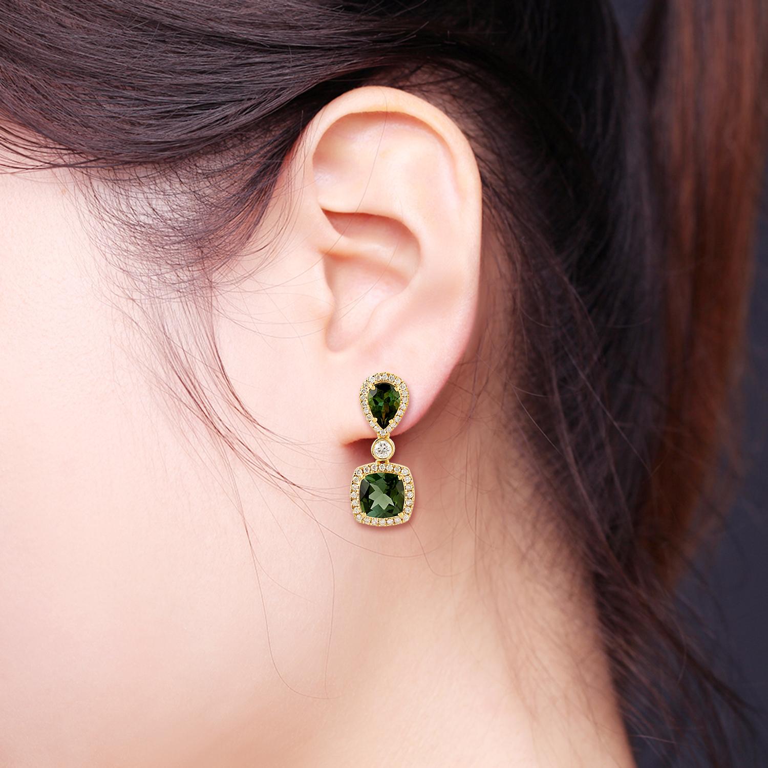 These beautiful drop earring are handcrafted in 18-karat gold. It is set with 3.94 carats tourmaline and .64 carats of glimmering diamonds.

FOLLOW  MEGHNA JEWELS storefront to view the latest collection & exclusive pieces.  Meghna Jewels is proudly