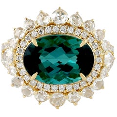 Anello in oro 18 carati con diamante e tormalina verde