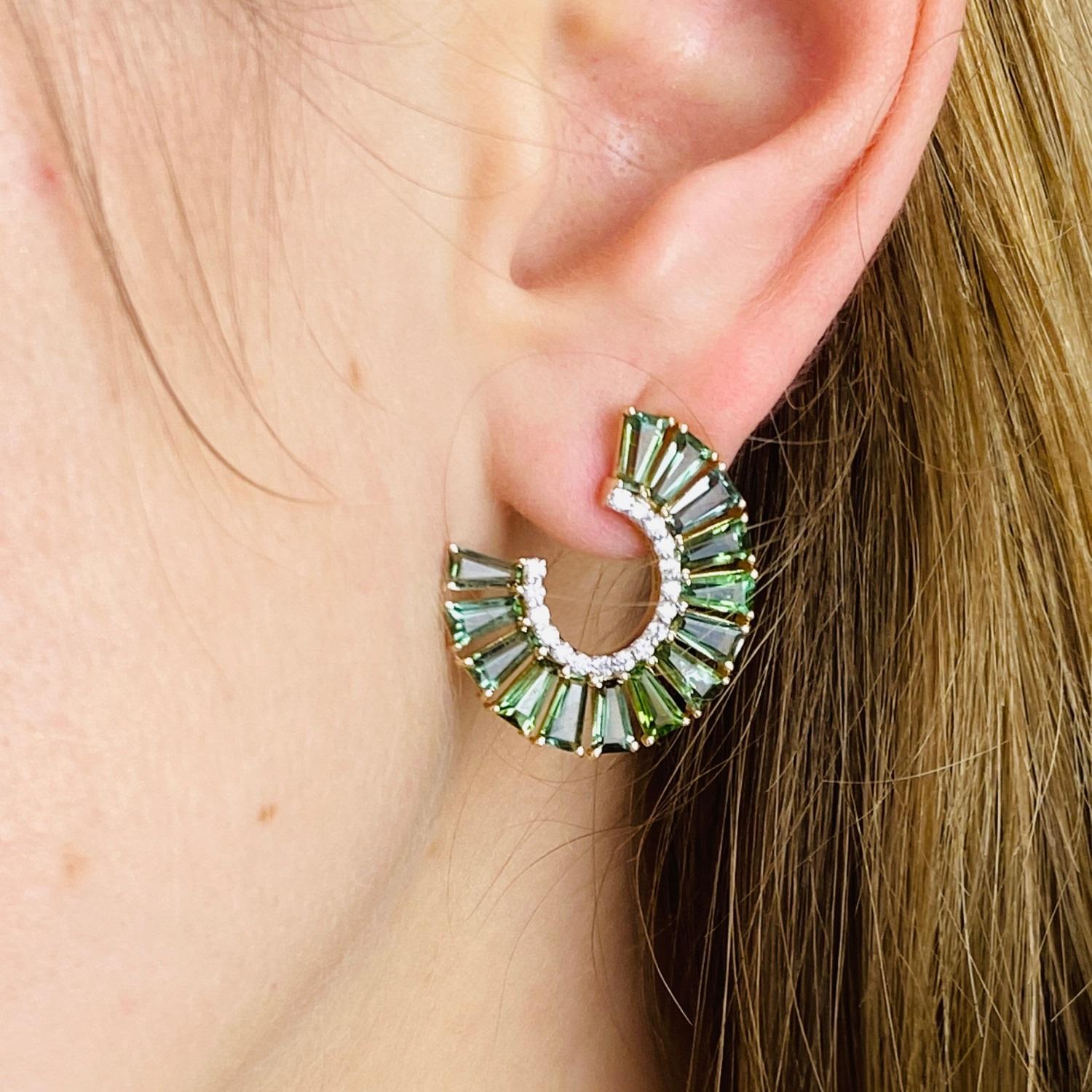 Tresor Beautiful Earring feature 5.70 total carats of Green Tourmaline & 0.35 carats of Diamond. The Earring is an ode to the luxurious yet classic beauty with sparkly gemstones and feminine hues. Their contemporary and modern design make them