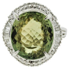 Bague en platine avec tourmaline verte et diamants