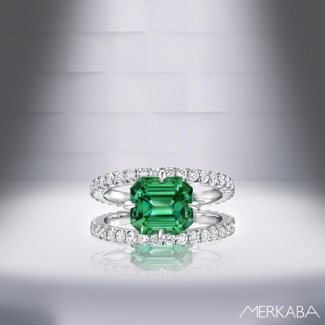 This vIbrant 2.76 carat Green Tourmaline Emerald Cut, is set in an ultra fine 1.06 carat diamond, double shank platinum ring,
Size 6. Resizing is complimentary upon request.
Returns are accepted and paid by us within 7 days of delivery.

Tourmaline