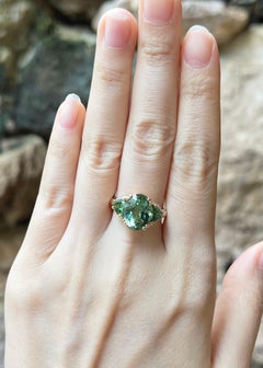 Green Tourmaline, Tsavorite and Diamond Ring set in 18K Rose Gold Settings