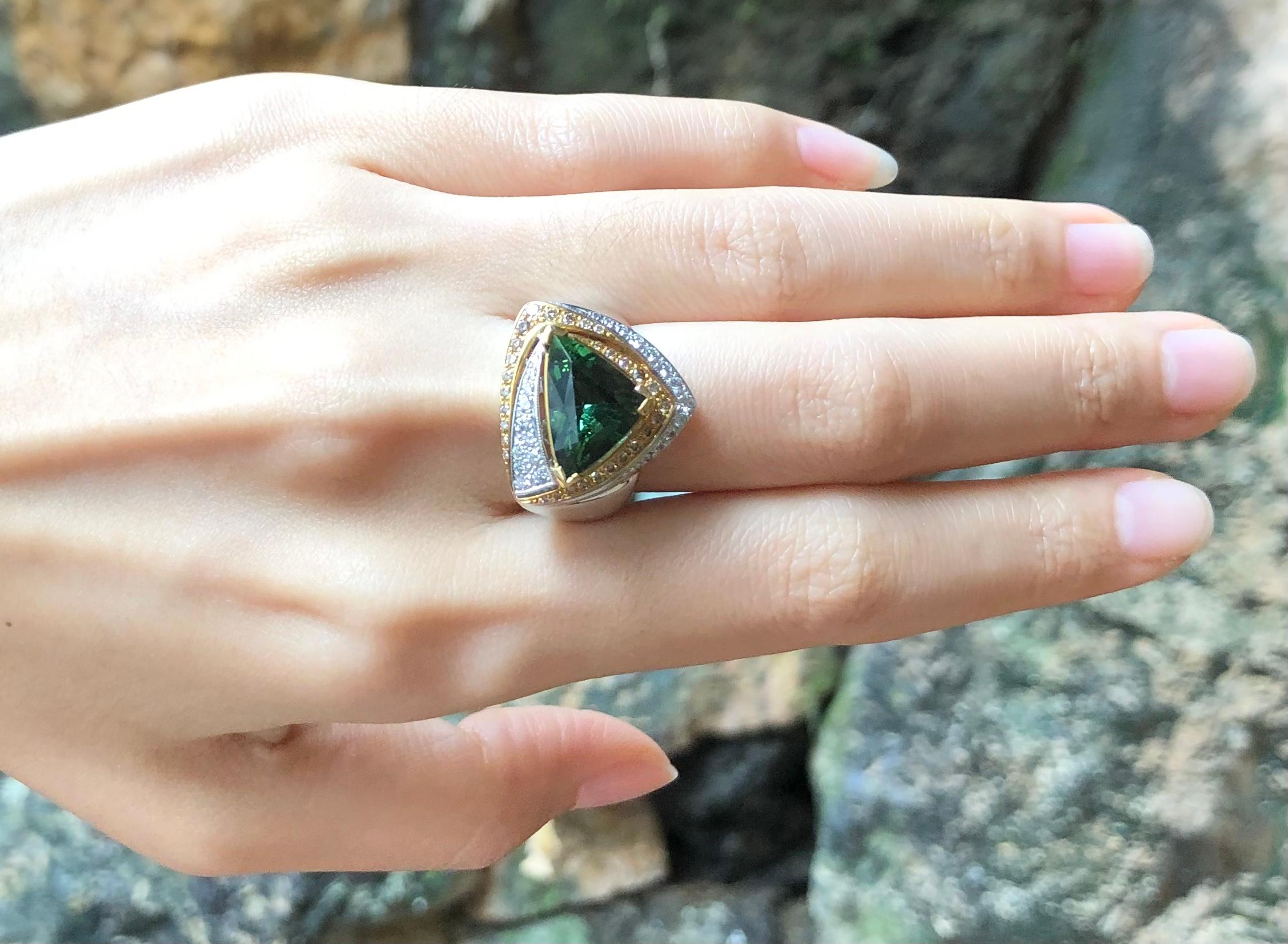 Green Tourmaline 4.14 carats with Brown Diamond 0.27 carat and Diamond 0.28 carat Ring set in 18 Karat White Gold Settings

Width:  2.0 cm 
Length: 1.9 cm
Ring Size: 12.15
Total Weight: 8.01 grams

Green Tourmaline 
Width:  1.5 cm 
Length: 1.0