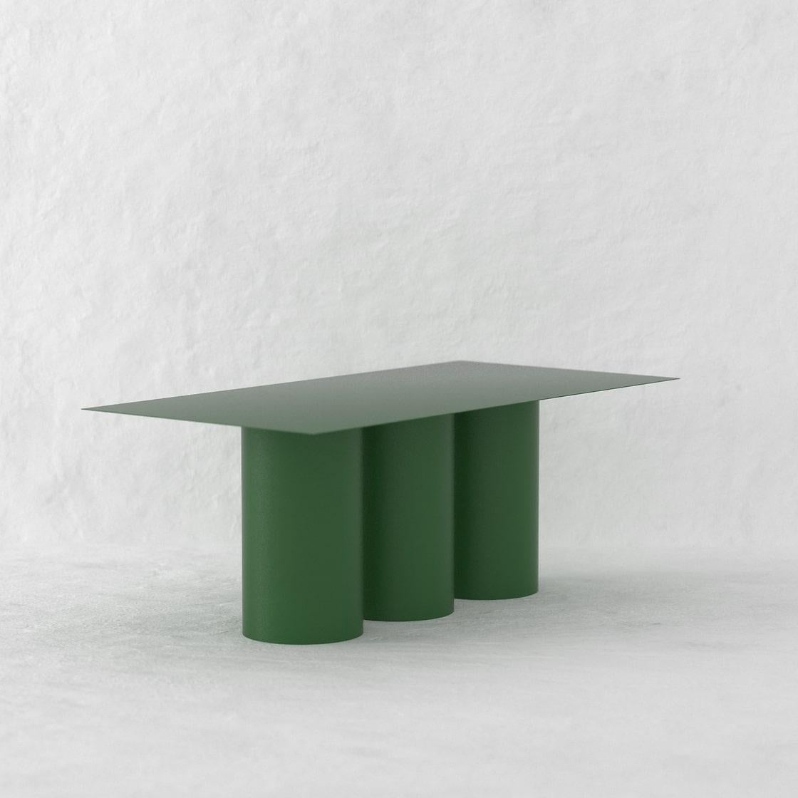 The Tripod Dining Table is a monolithic piece conceptualized as a dining table suitable for both, indoor and outdoor. 
Crafted by hand in metal and coated with a matte electrostatic finish it's size can be customized.
The Tripod Dining Table seats 8