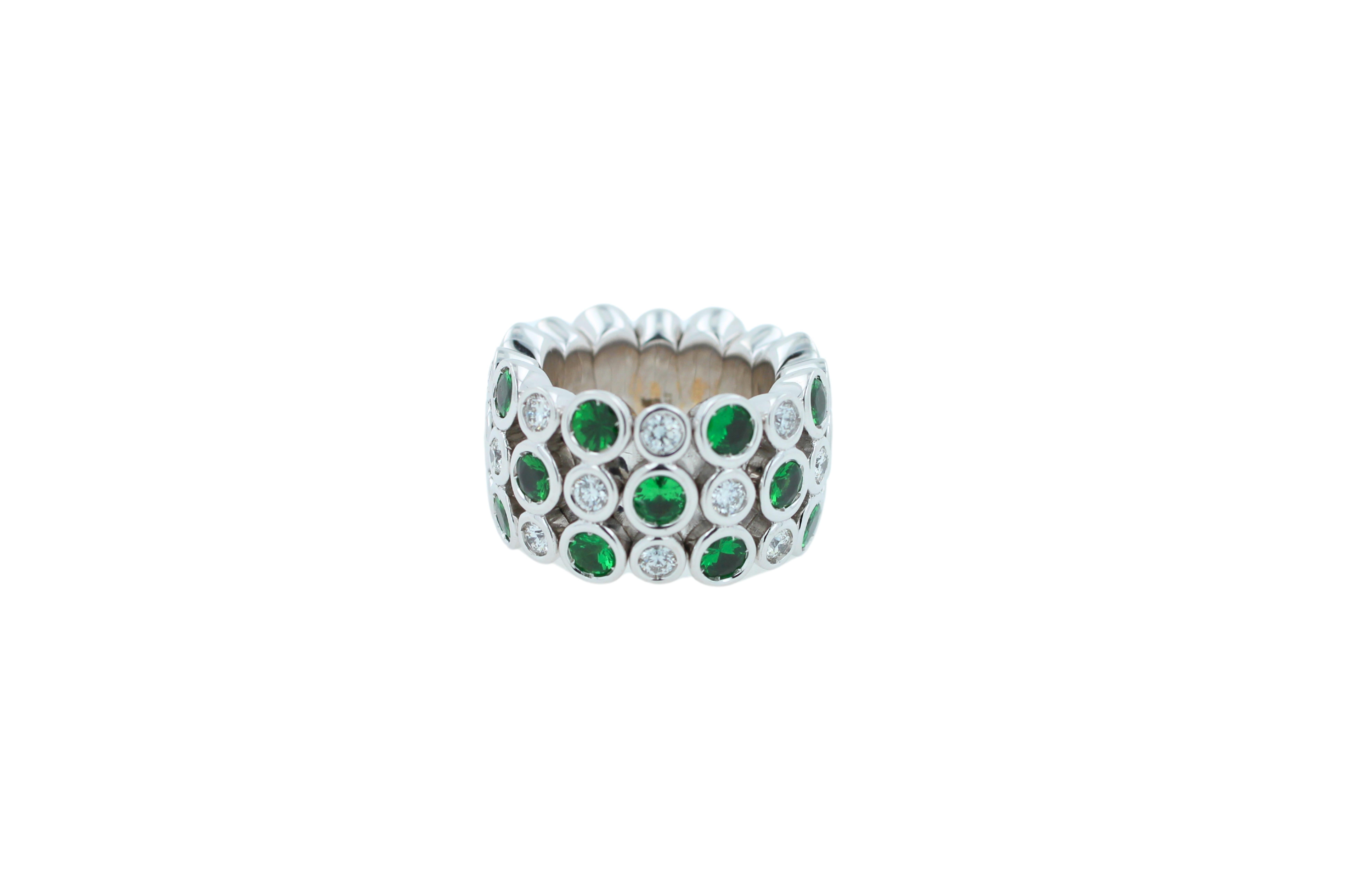 Modern Green Tsavorite Diamond Flexible Bezel Eternity Band 18 Karat White Gold Ring For Sale