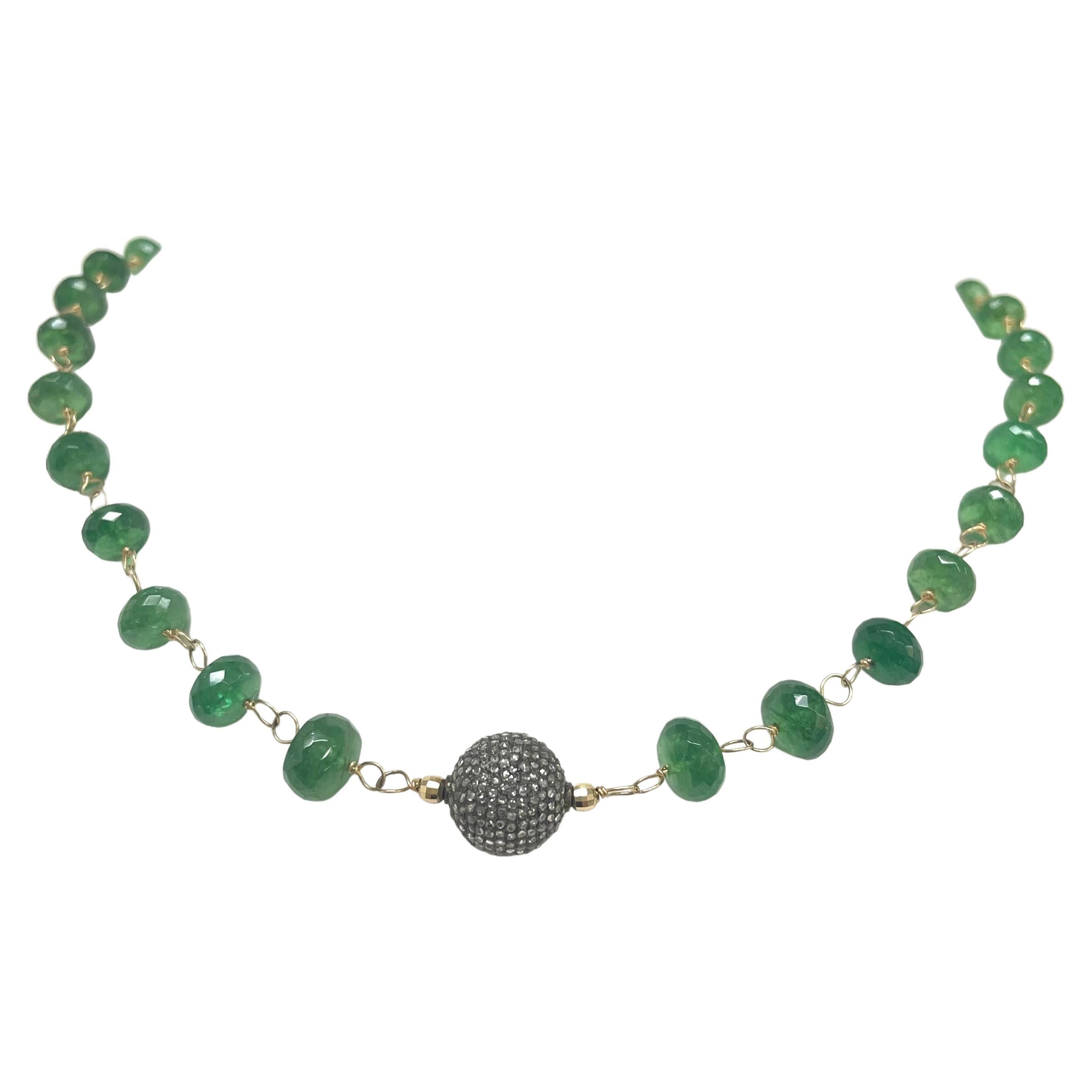 Description
Vibrant green, rare Tsavorite Garnet faceted rondelles, individually hand wrapped with 14k yellow gold wire and embellished with a 12.5mm pave diamond ball. Item # N3748
For a stylish layered look, add an additional matching Necklace