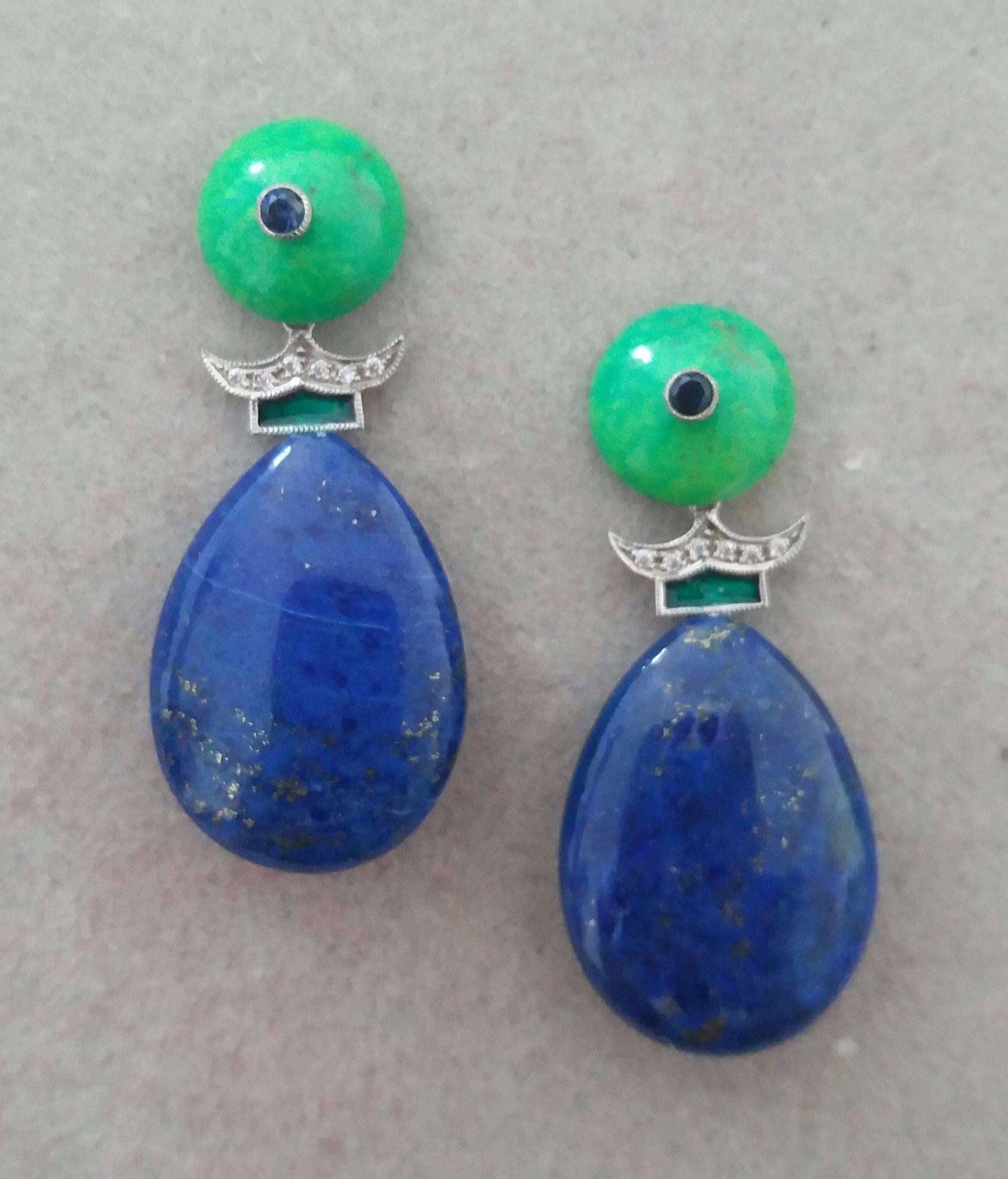 In these unique art deco style earrings we have the upper parts composed by 2 Turkmenistan Green Turquoise round buttons 12 mm in diameter with small round Blue Sapphires in the center, the central parts are composed by a pair of 14 kt gold elements