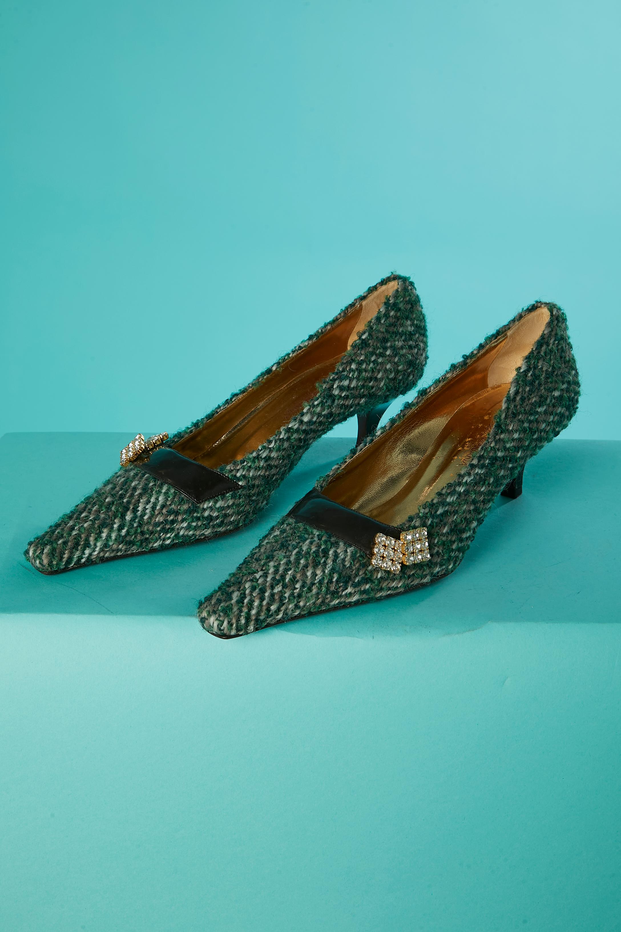 Green tweed and rhinestone low heels pump. Black leather patent details . 
Heel's height : 5,5 cm 
SHOE SIZE 40 (Eu) 8 (US) 