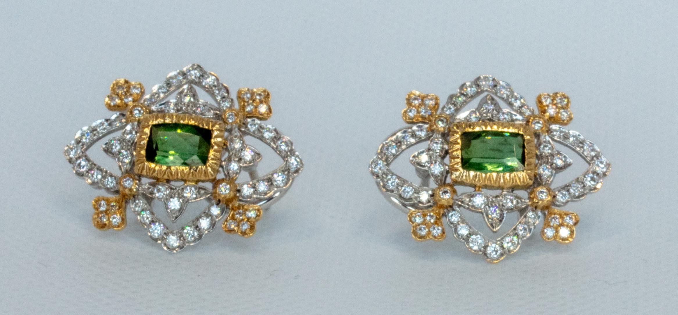 The best kind of statement earrings, these completely authentic earrings are a timeless classic that will age well and be cherished for generations. The unexpected curves, the exquisite cut pair of Afghan tourmalines, the elegantly executed hand
