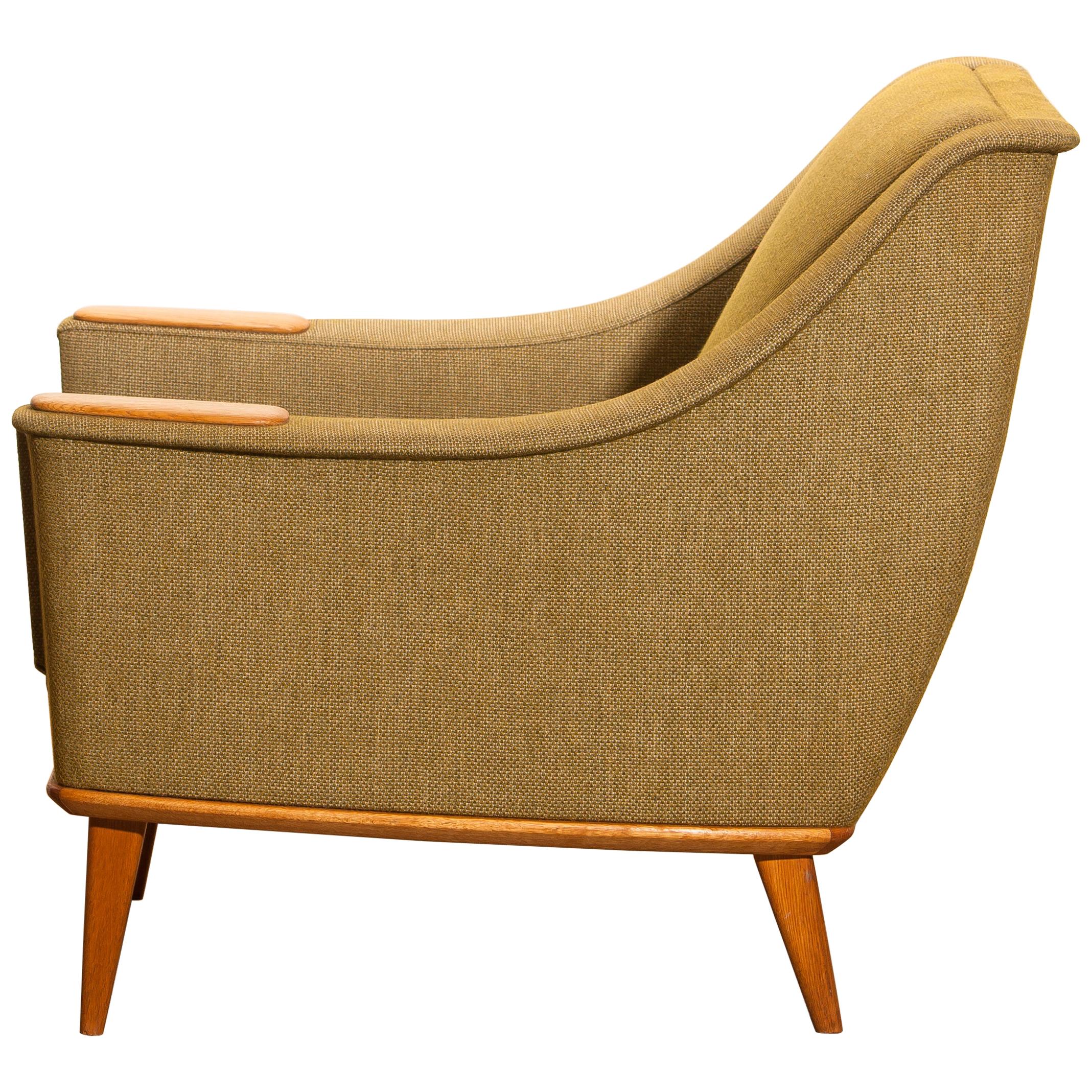 Mid-Century Modern Green Upholstered Oak Lounge / Easy Chair by Folke Ohlsson for DUX, 1960, Sweden