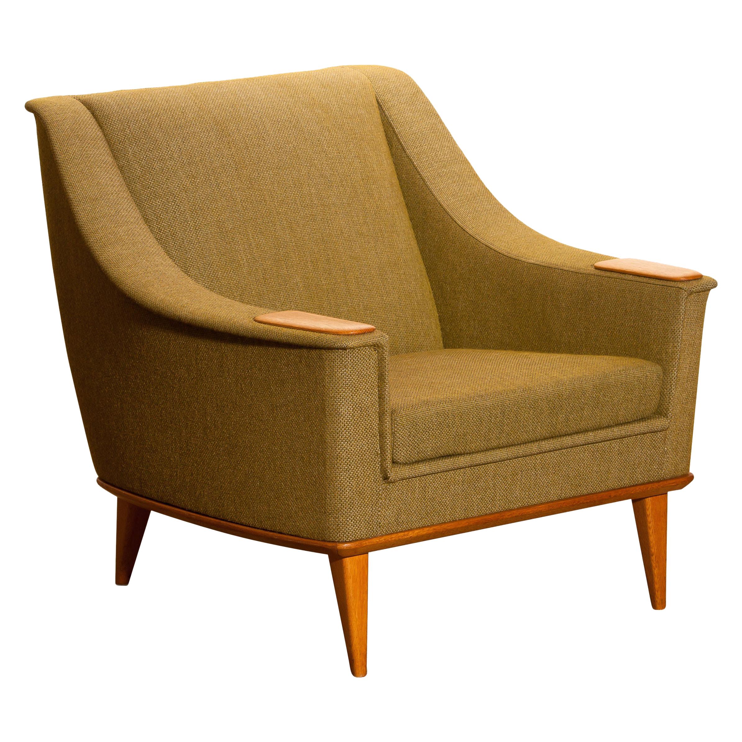 Swedish Green Upholstered Oak Lounge / Easy Chair by Folke Ohlsson for DUX, 1960, Sweden