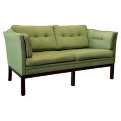 Green Upholstered Two Seater Sofa