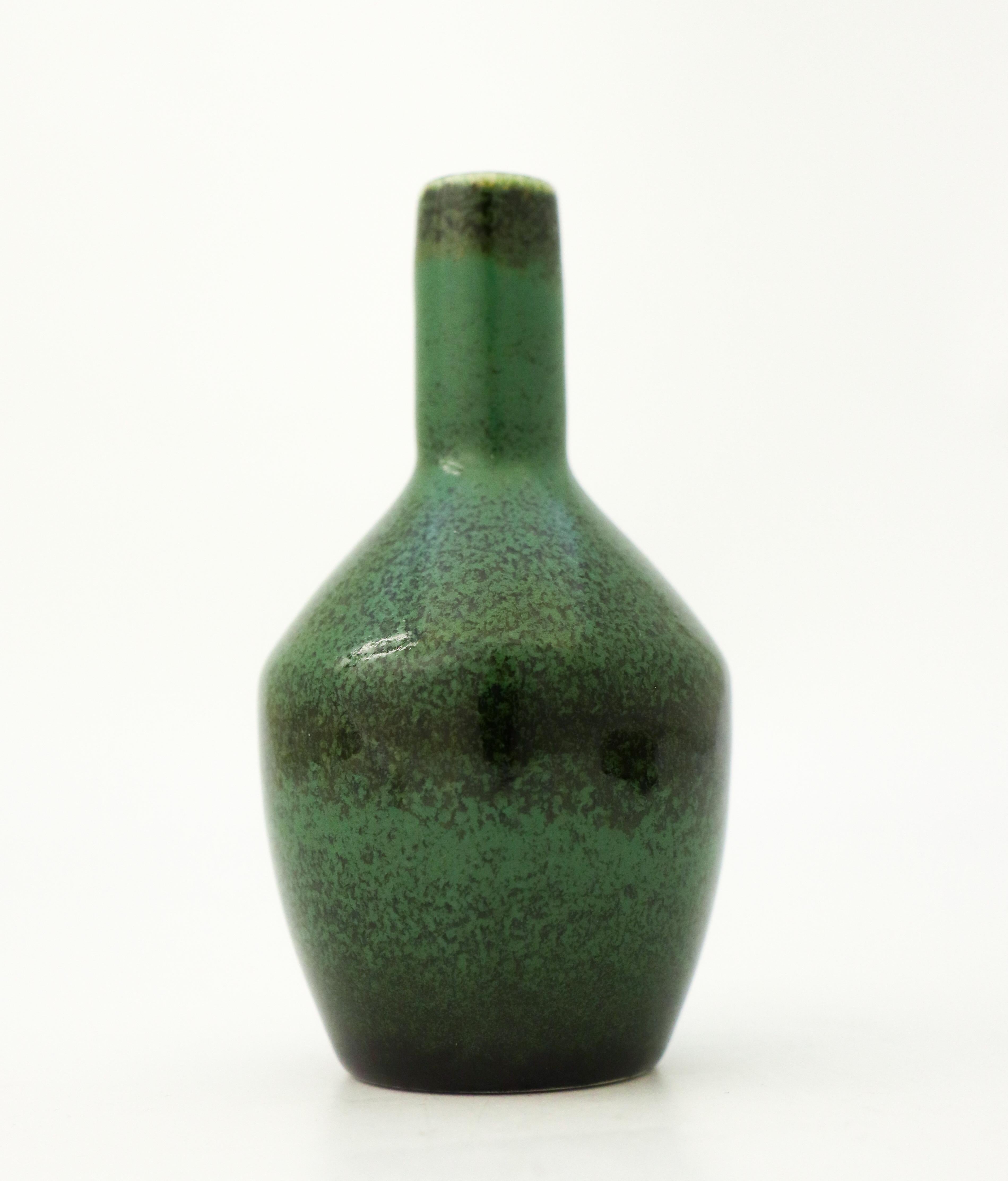 A green vase designed by Carl-Harry Stålhane at Rörstrand, it´s 10 cm (4
