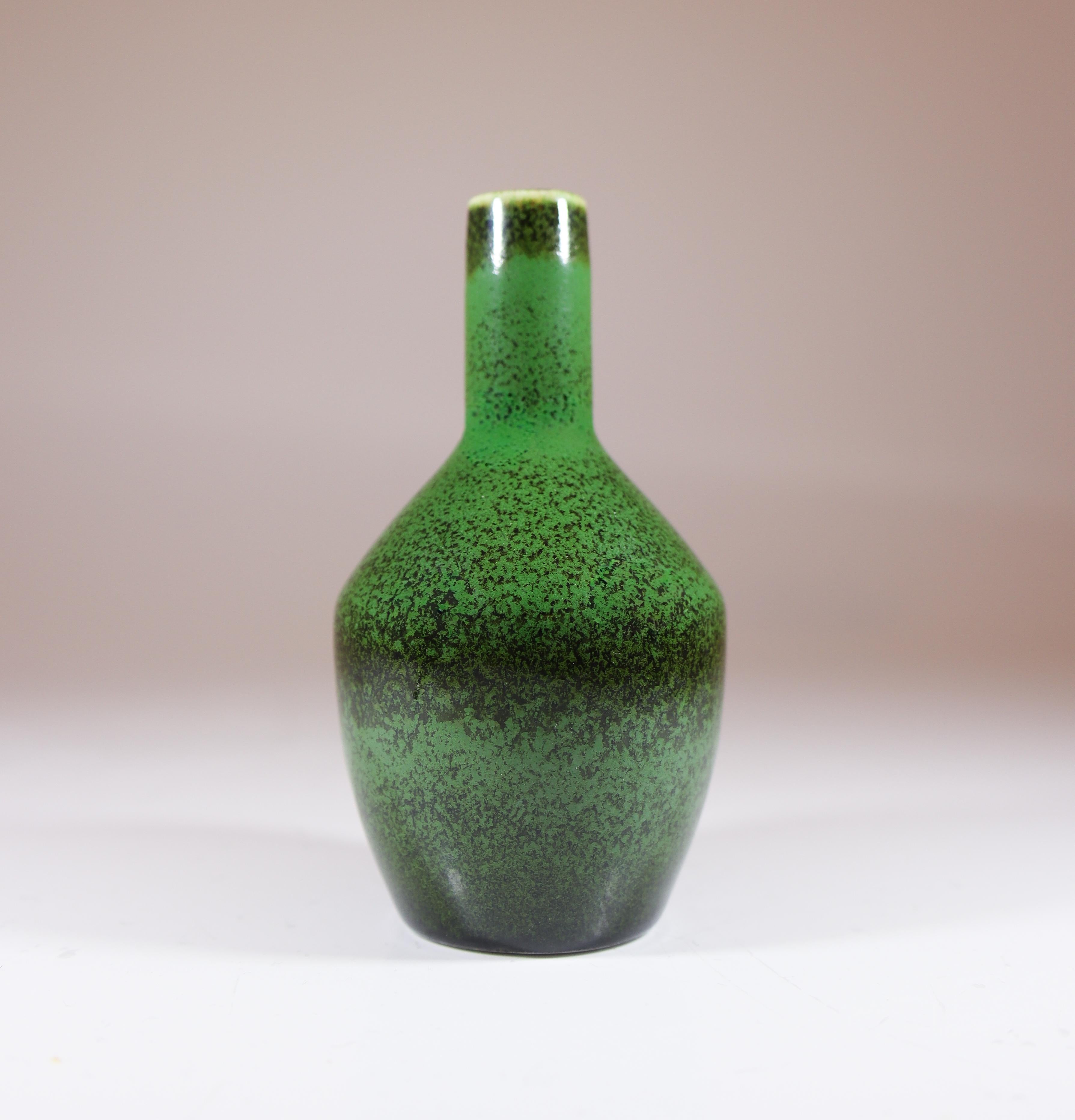 A green vase designed by Carl-Harry Stålhane at Rörstrand, it´s 10 cm (4