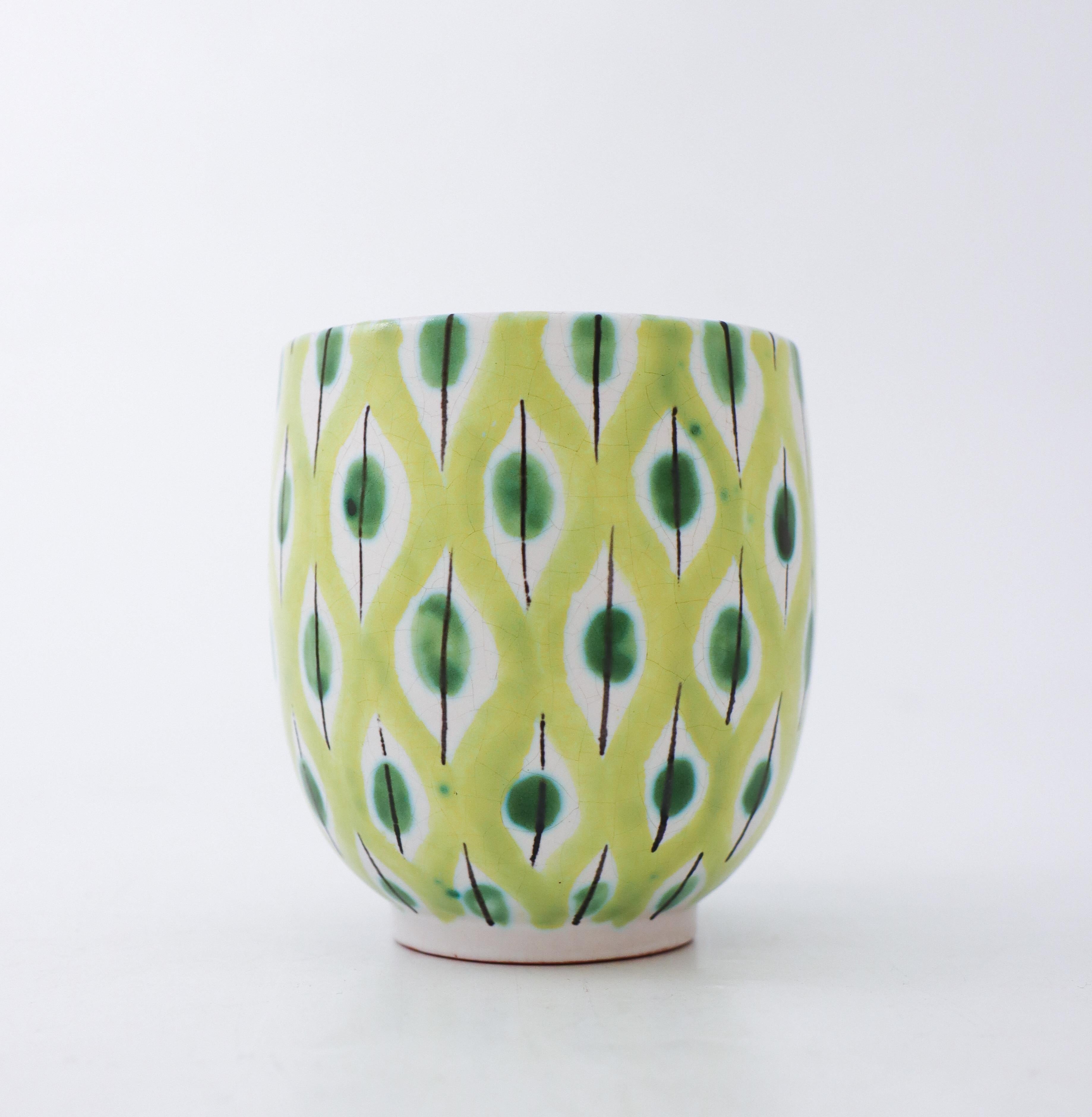 A vase in faience designed by Stig Lindberg at Gustavsbergs Studio in Stockholm, it is 9.5 cm (3.8