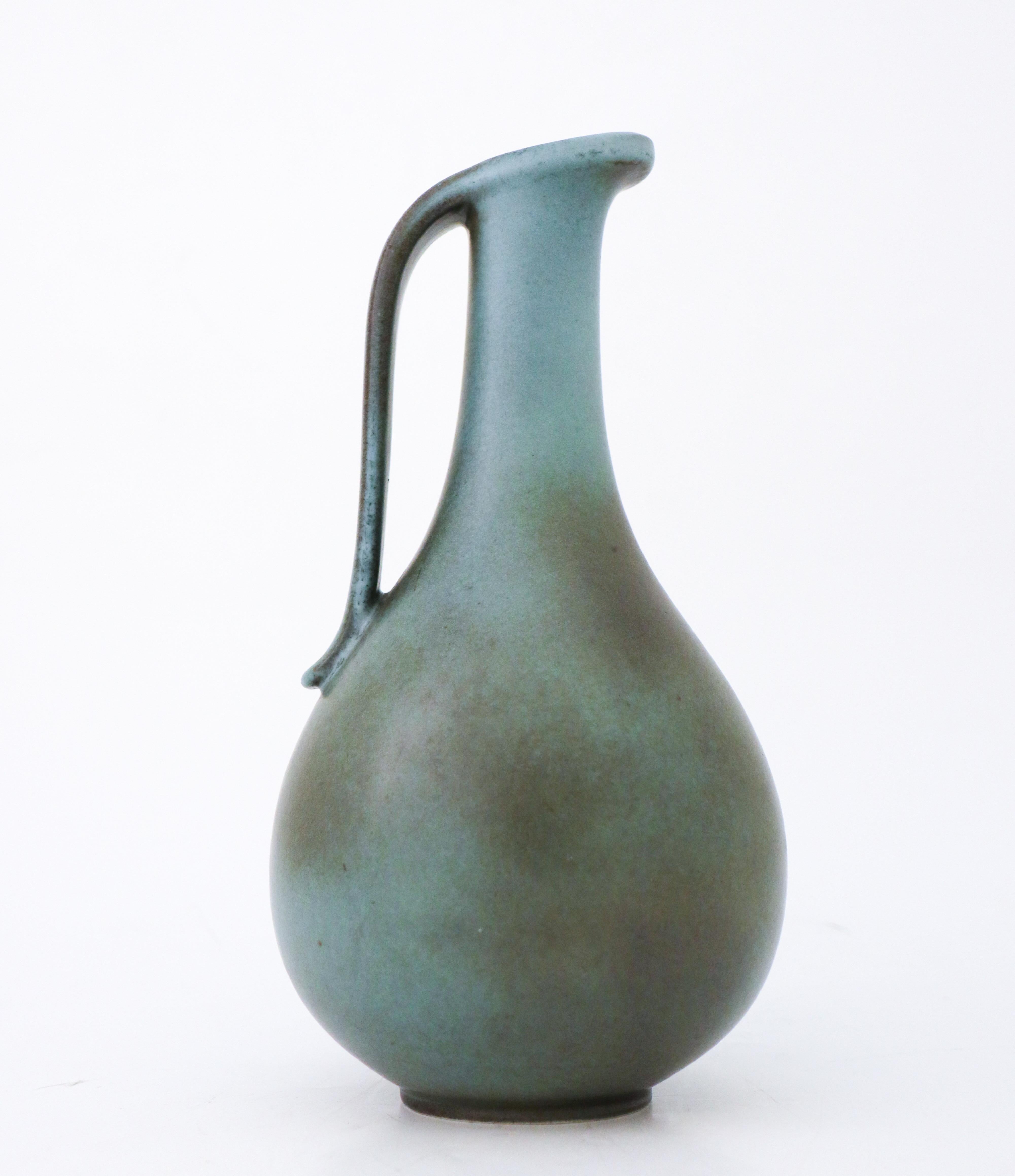 A lovely green/turquoise vase designed by Gunnar Nylund at Rörstrand, it´s 24.5 cm (7