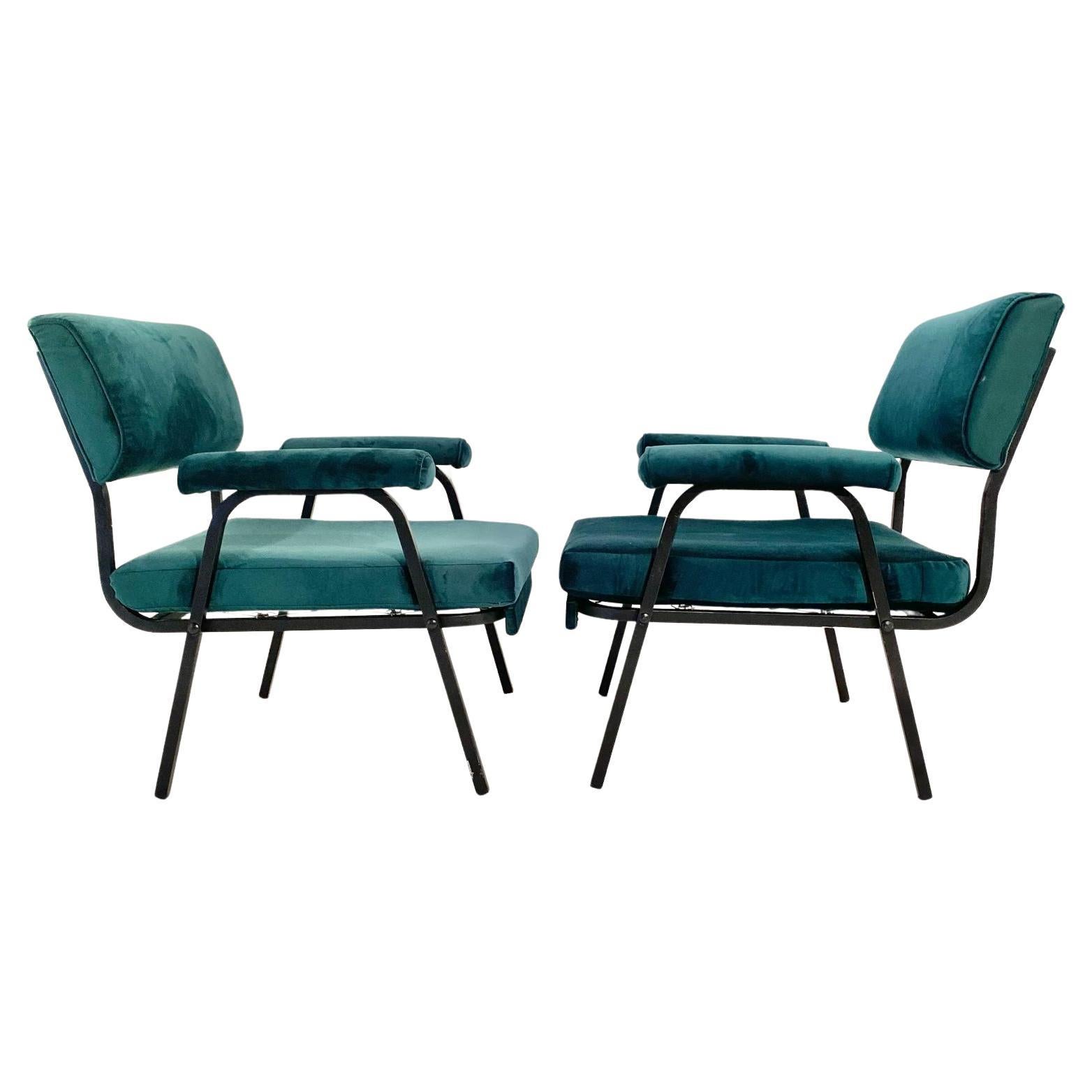 Vintage green armchairs, set of two, Italy 1960s.
A set of two green armchairs manufactured in Italy in the 1960s. Fabric dark green cover and black painted iron structure. Typical mid-century design.

Original fabric. In really good
