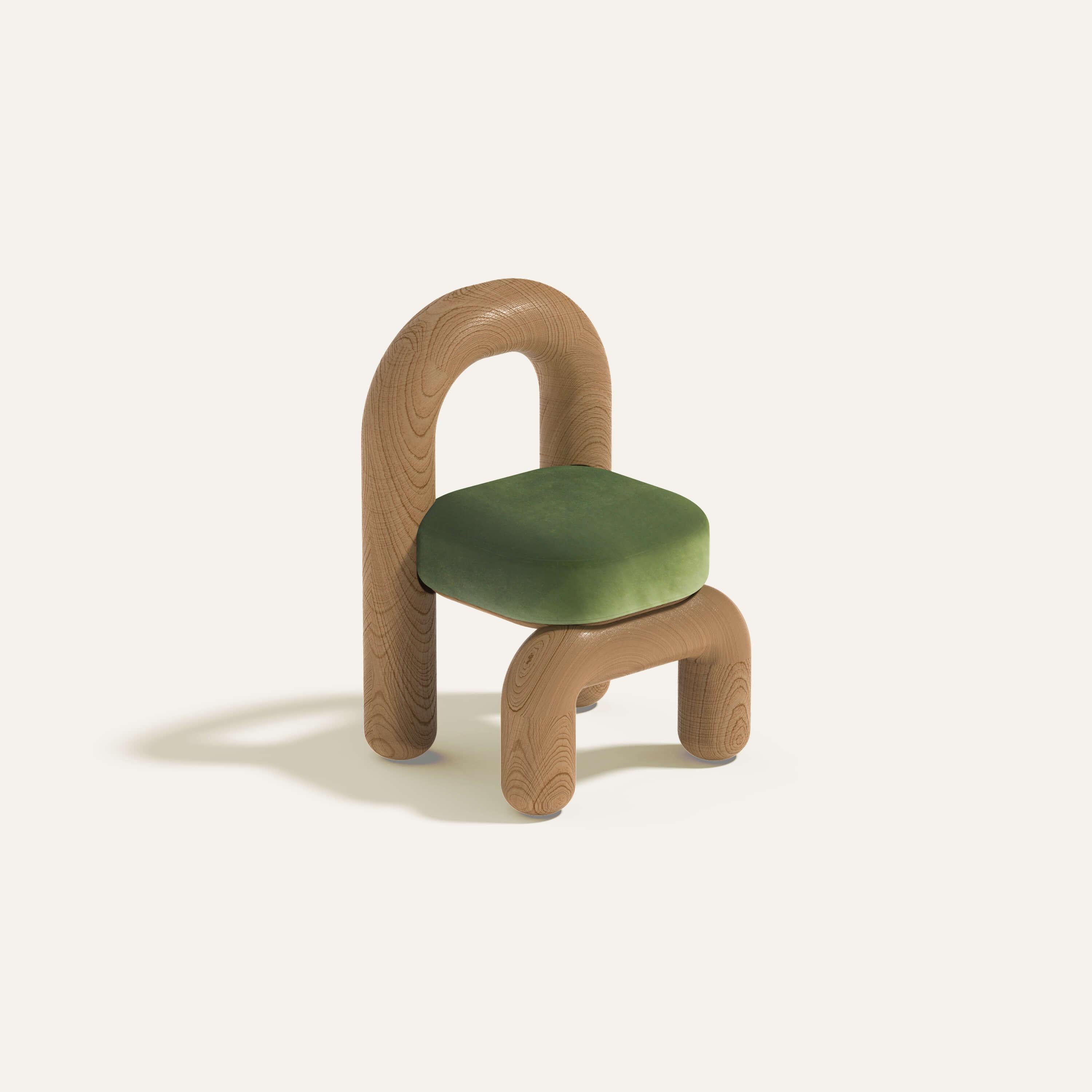 Green Velvet Natural Oak Lithic Dining Chair by Maha Alavi Studio
Dimensions: W 58 x D 54 x H 86 cm
Materials: Solid Oak.

Maha Alavi is a Tokyo-based Canadian industrial designer. Her practice aims to explore context through connection and