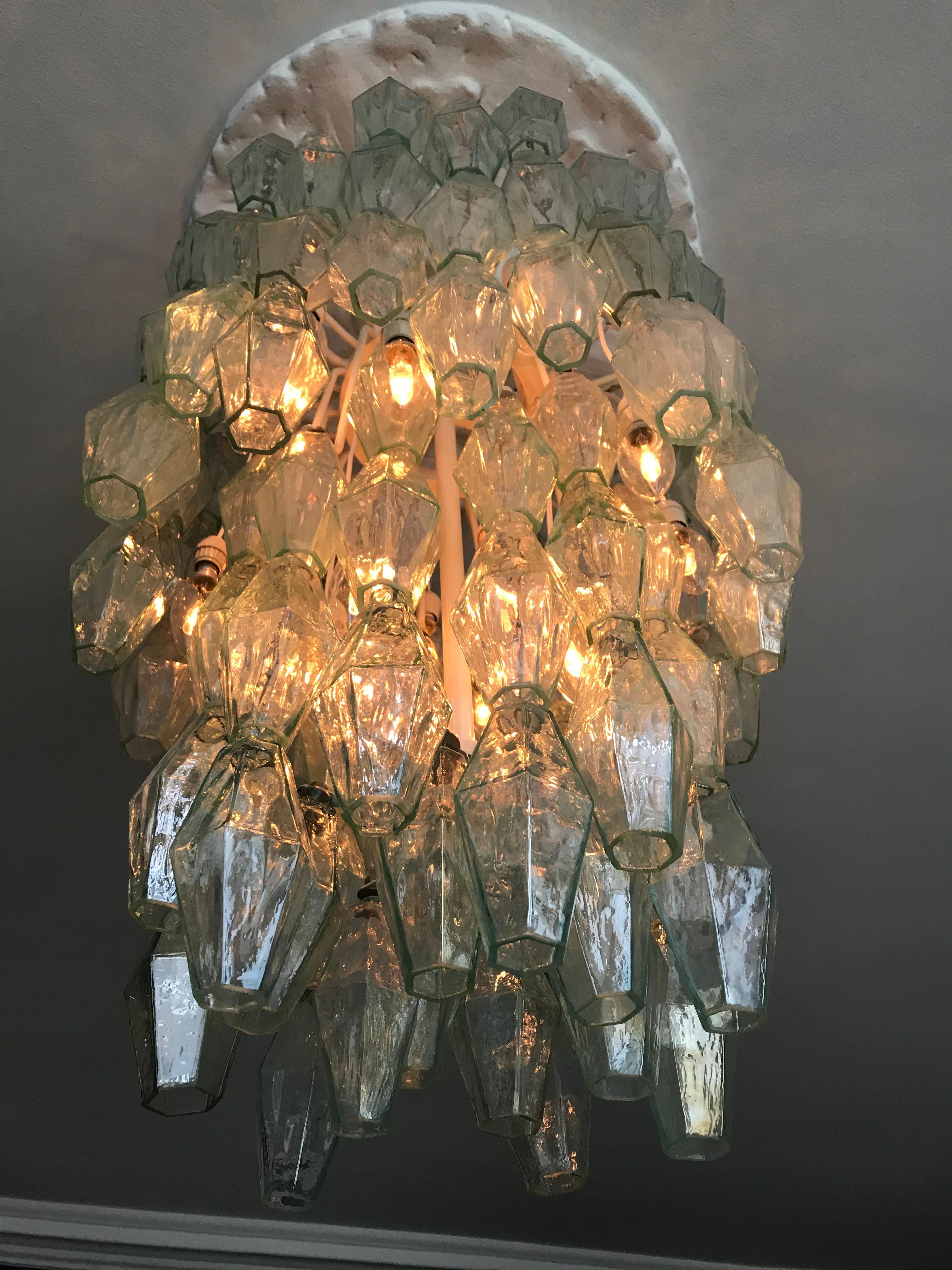 Beautiful polyhedral chandelier in green and clear blown glass.