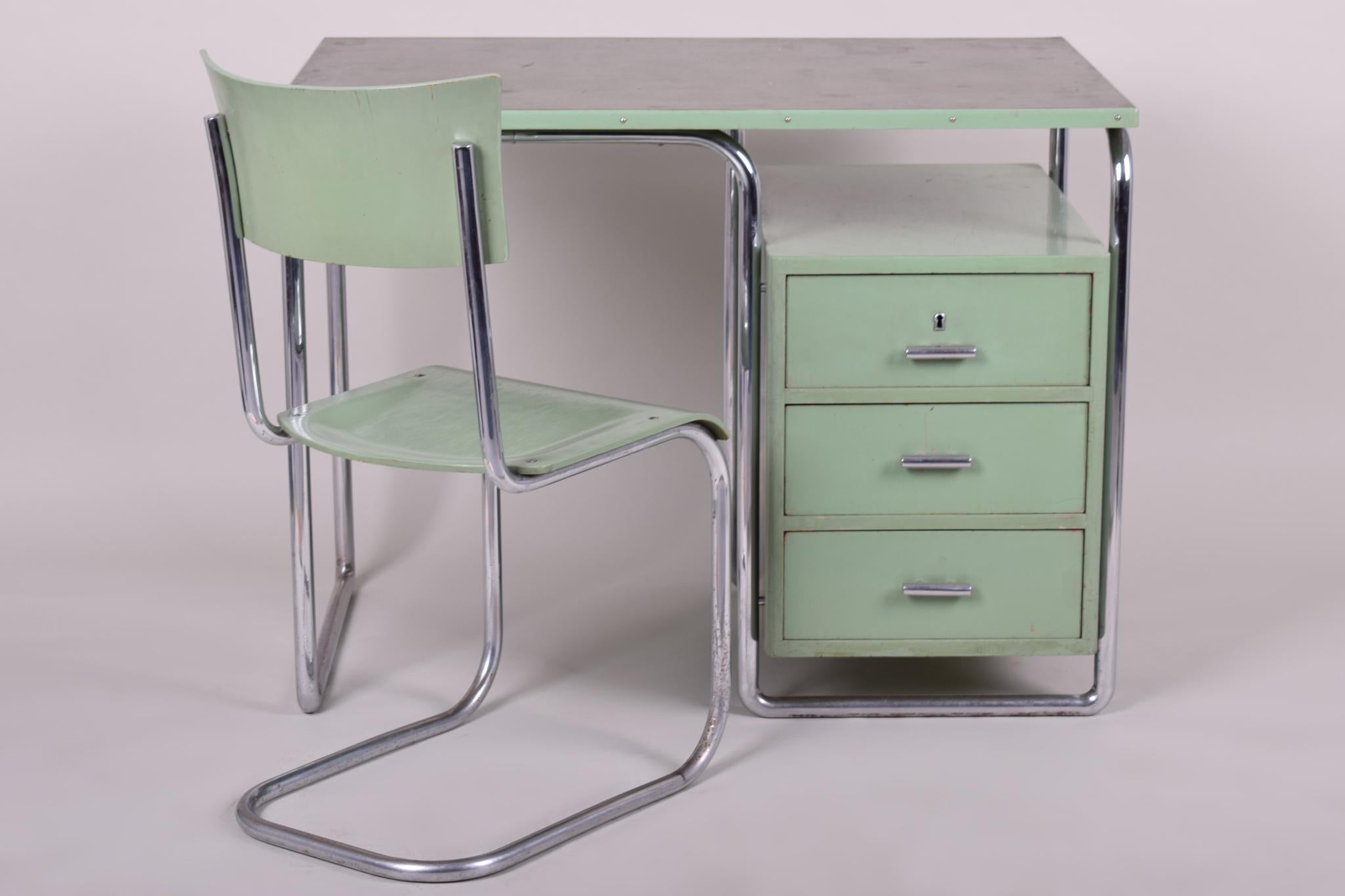 This original Bauhaus writing desk manufactured by Mücke-Melder is a perfect representation of the simplistic elegance of the Bauhaus Era.

This perfect example of Czech Bauhaus style was produced by Mücke-Melder which hails from a weighty