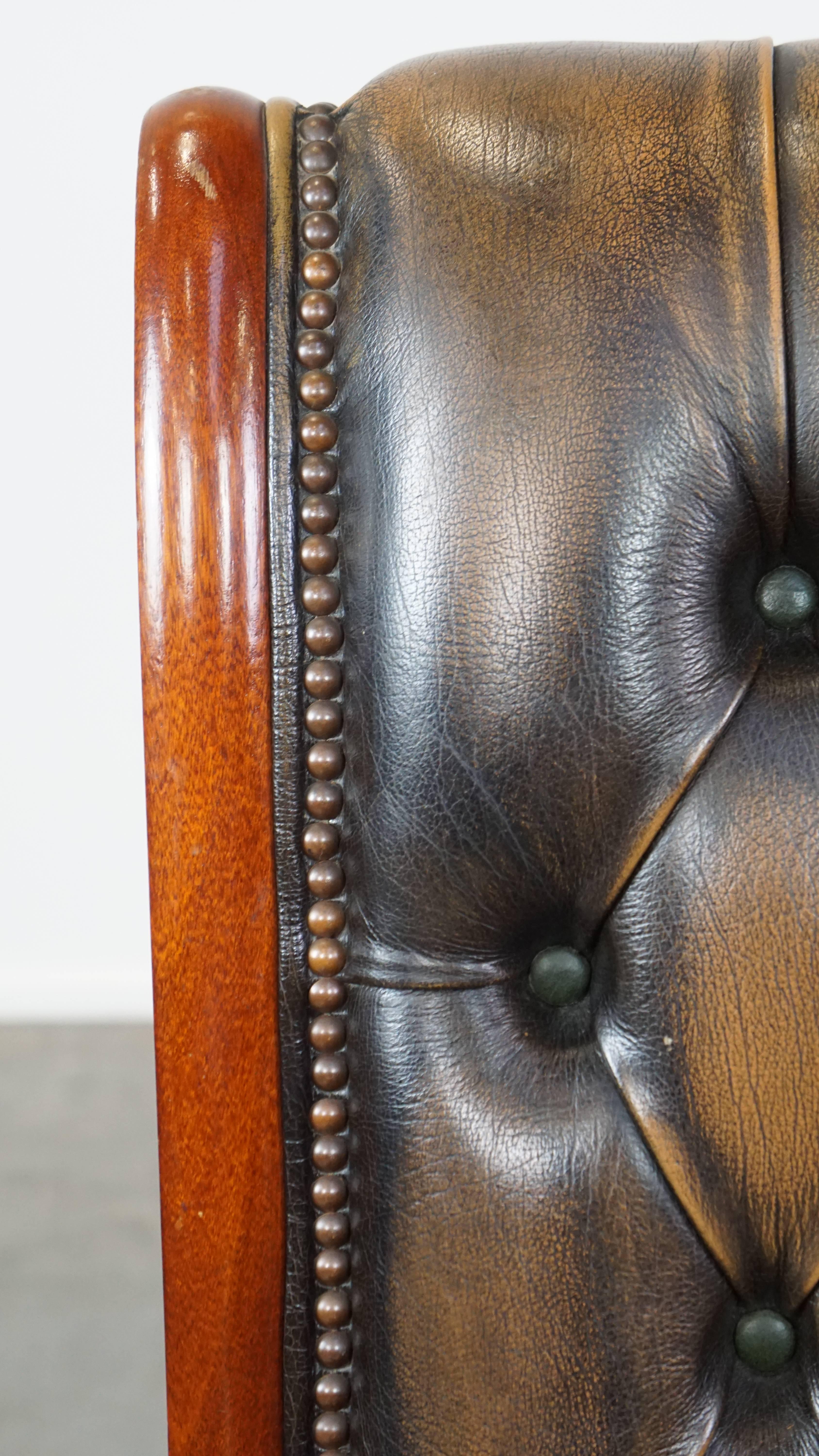 Green Vintage English Chesterfield Armchair with Elegant Design and Wood Accents For Sale 4