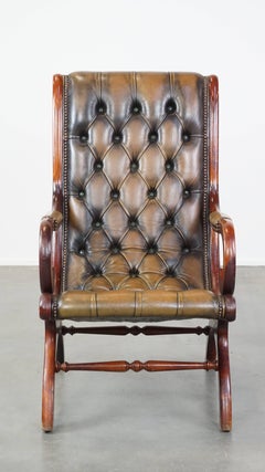 Green Vintage English Chesterfield Armchair with Elegant Design and Wood Accents