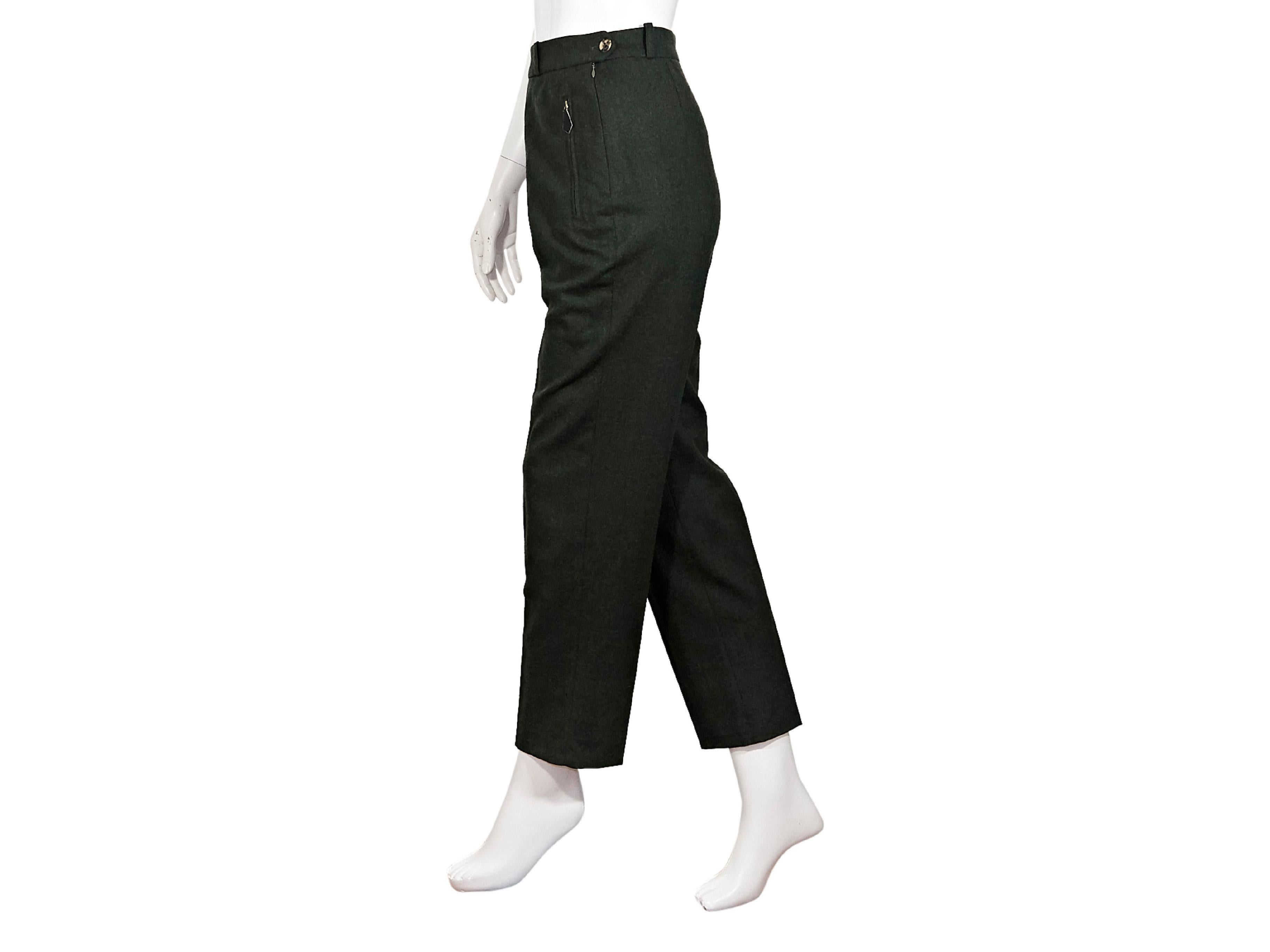 Product details:  Vintage green wool pants by Hermes.  Banded waist with belt loops.  Waist zip pockets. Side button with concealed side zip closure.  Label size FR 36.  28
