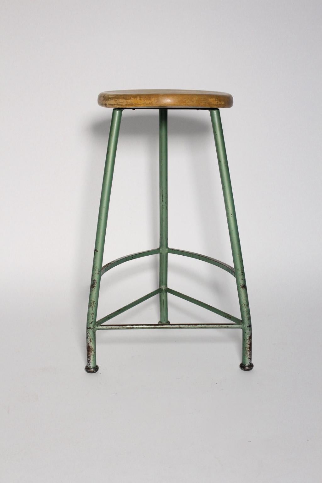 green metal stool