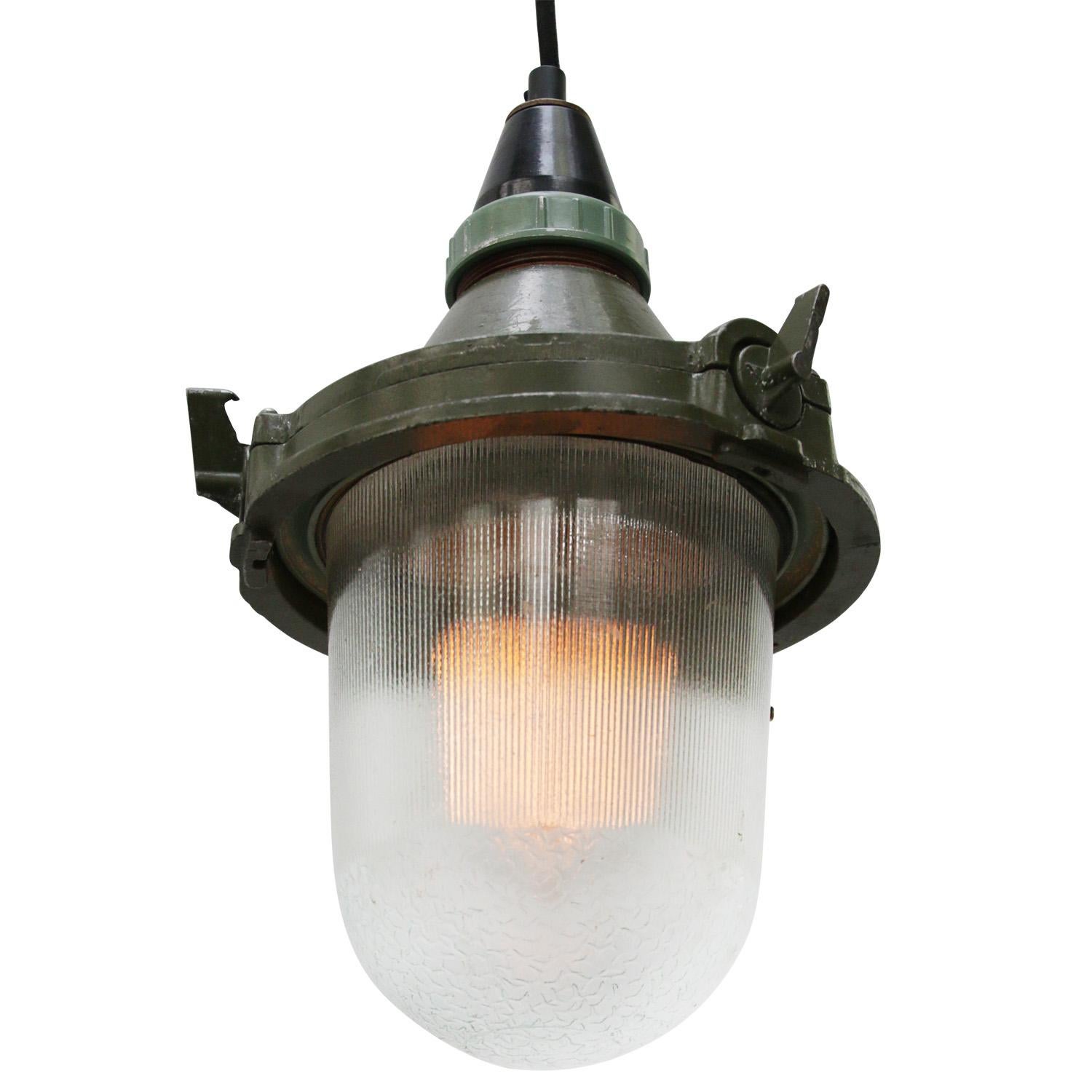 Green industrial pendant.
Aluminum with bakelite top.
Clear striped glass. 

Weight: 1.00 kg / 2.2 lb

Priced per individual item. All lamps have been made suitable by international standards for incandescent light bulbs, energy-efficient and