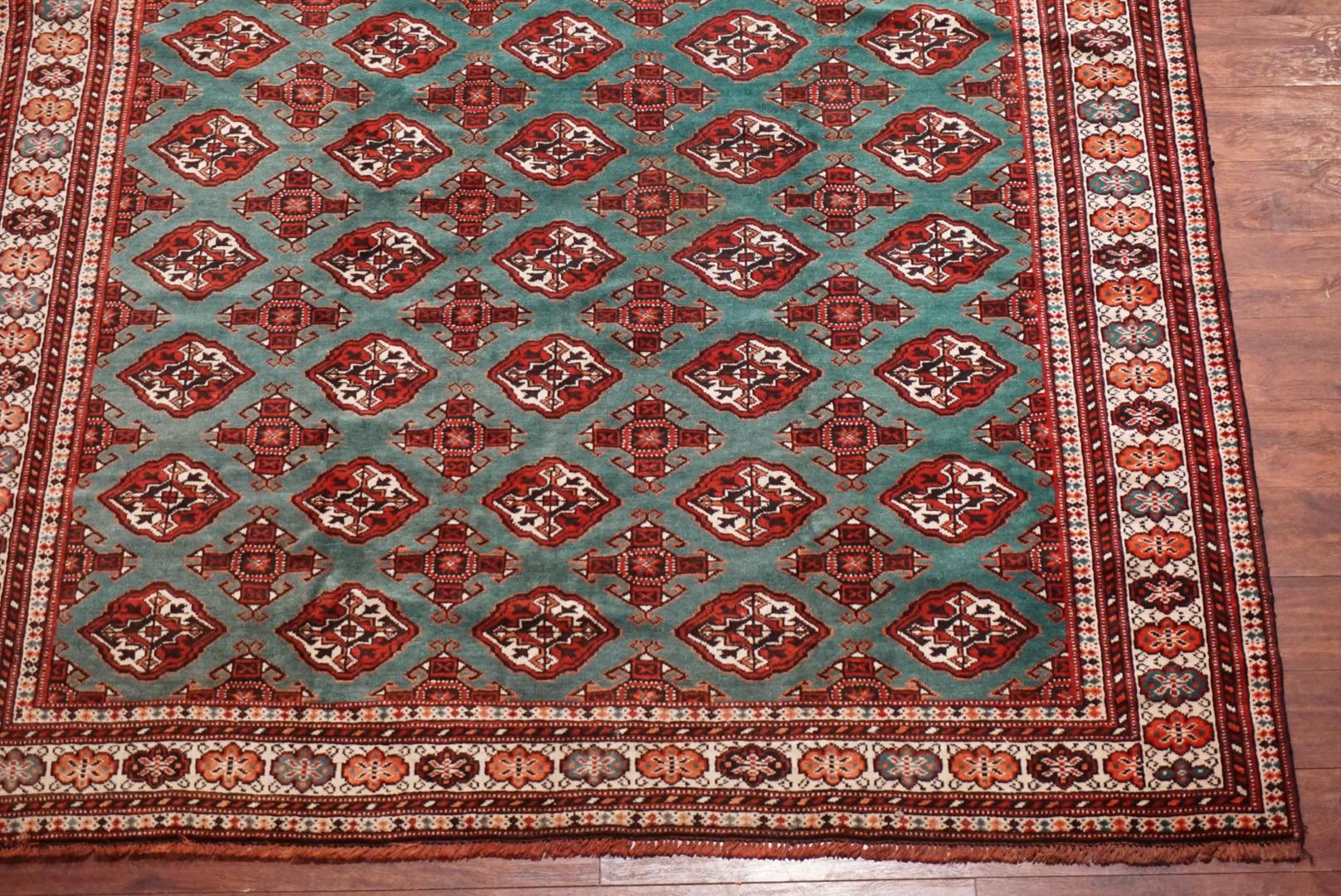 Hand-Knotted Green Vintage Pak Bukhara Rug, circa 1970 For Sale