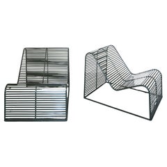 Green "Wave" Metal Lounge Chairs.
