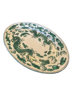 Antique green-and-white Japanese dragon dish