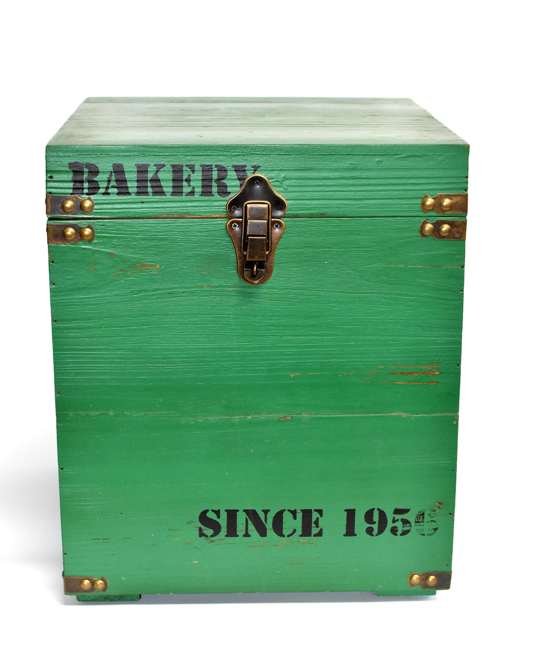 A brand new wooden box painted in beautiful green color. White stenciled 