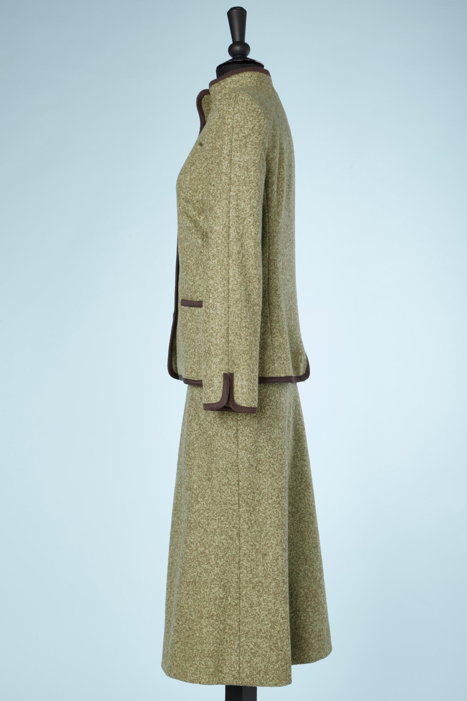 Green wool skirt-suit with brown braids piping Ivoire de Balmain Circa 1980's  For Sale 1