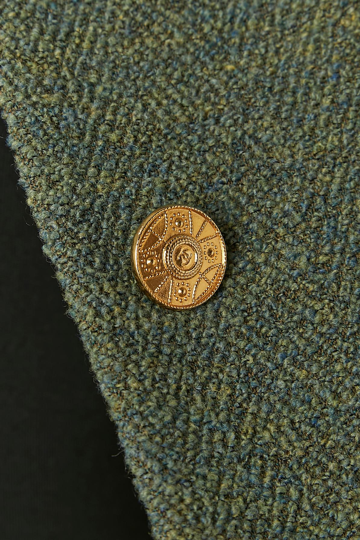 Green wool tweed skirt suit with gold buttons and fur pompoms Chanel Boutique 6