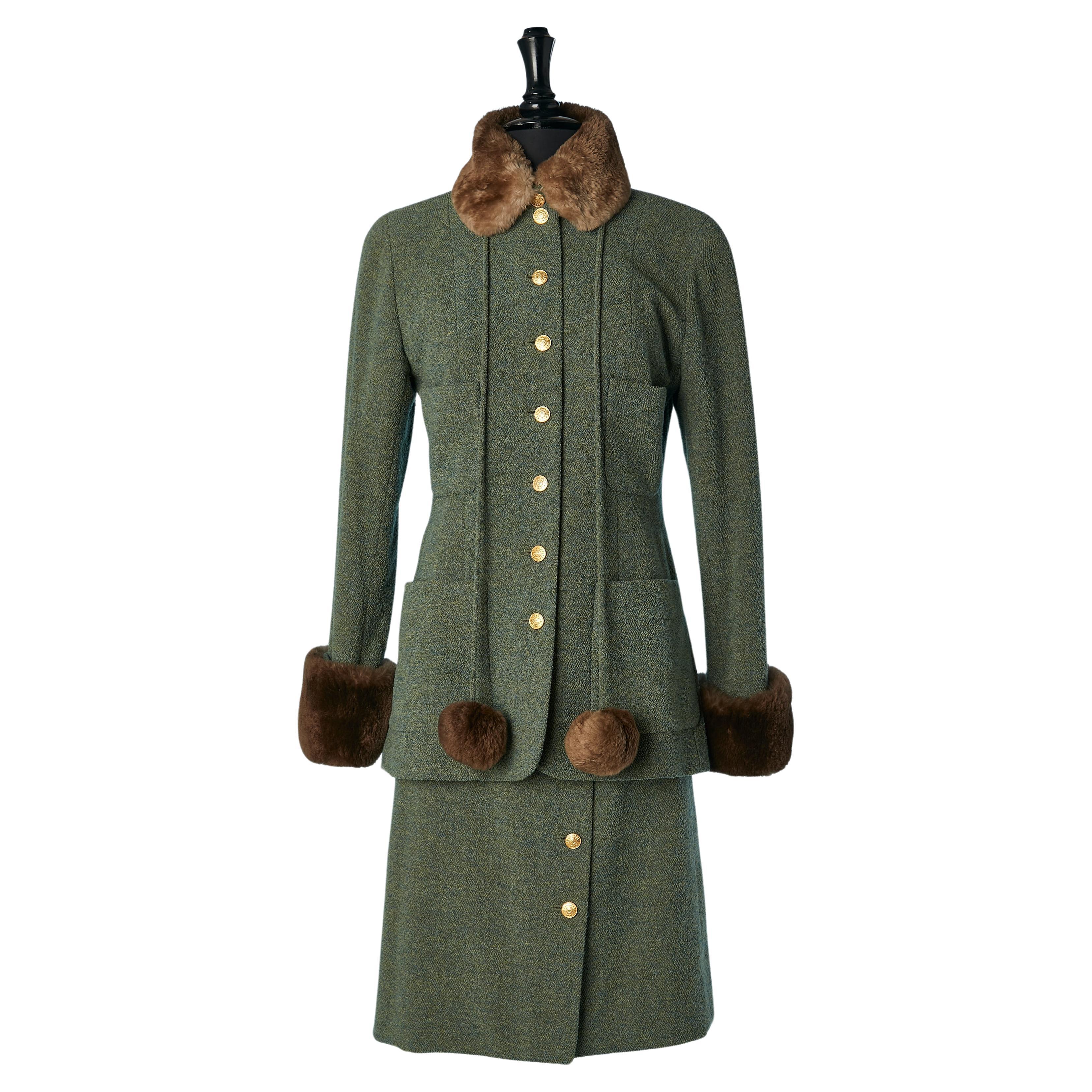 Green wool tweed skirt suit with gold buttons and fur pompoms Chanel Boutique  For Sale