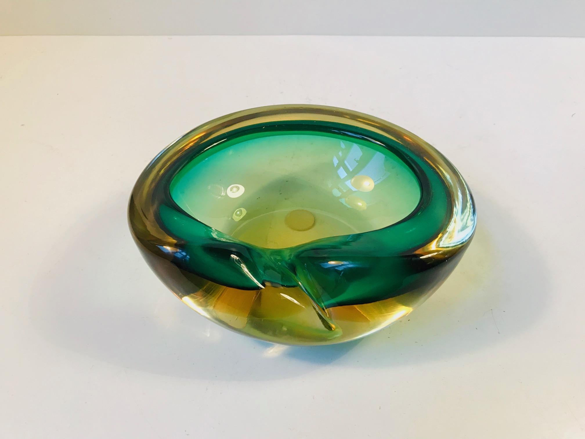 - A partially collapsed Sommerso bowl
- Made in green, yellow, and clear glass
- Made in Murano Italy during the late 1950s or early 1960s.