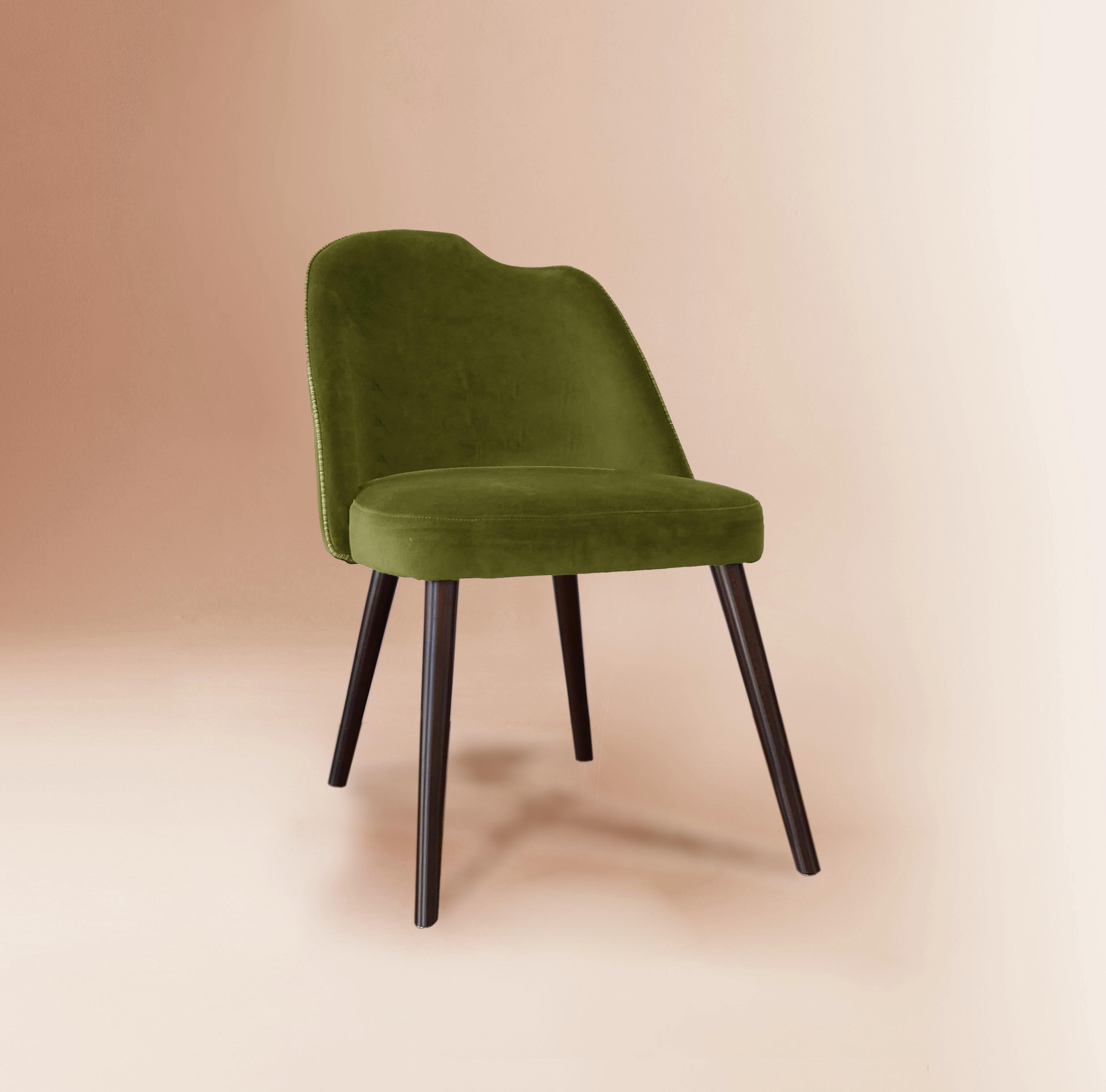 Green Yves chair by Dovain Studio
Dimensions: H 85 x W 54 x D 54 x SH 49 cm.
Materials: velvet, wood.

Dovain Studio
Creative direction by Sergio Prieto, a Spanish artist-designer who was born in Talavera de la Reina in 1994. He dedicated