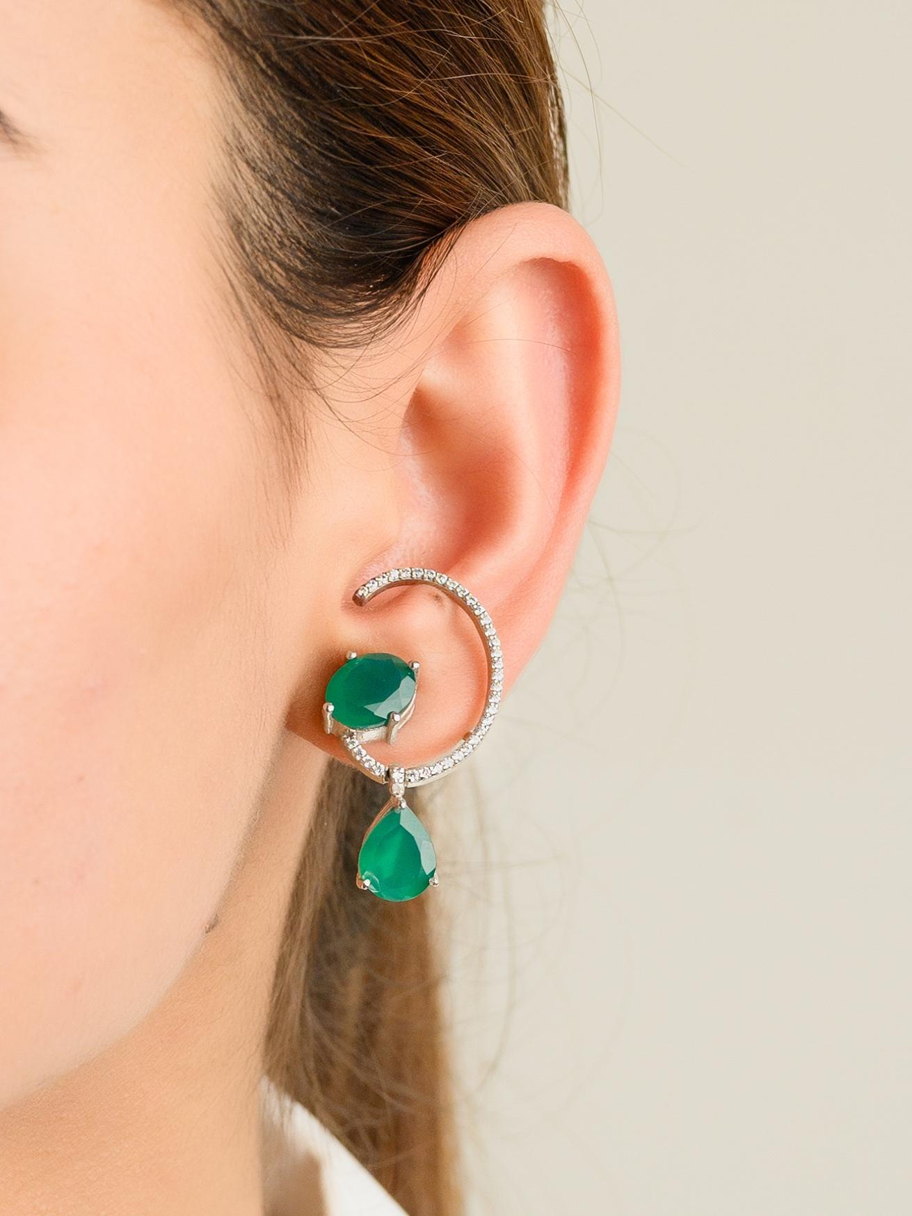 Green Zircon Pushback Cuff Earrings in sterling silver. You shall need Big Stud Earrings to make a statement with your look. Each piece features dazzling cubic zirconia stones, renowned for their brilliance and clarity, set in high-quality sterling