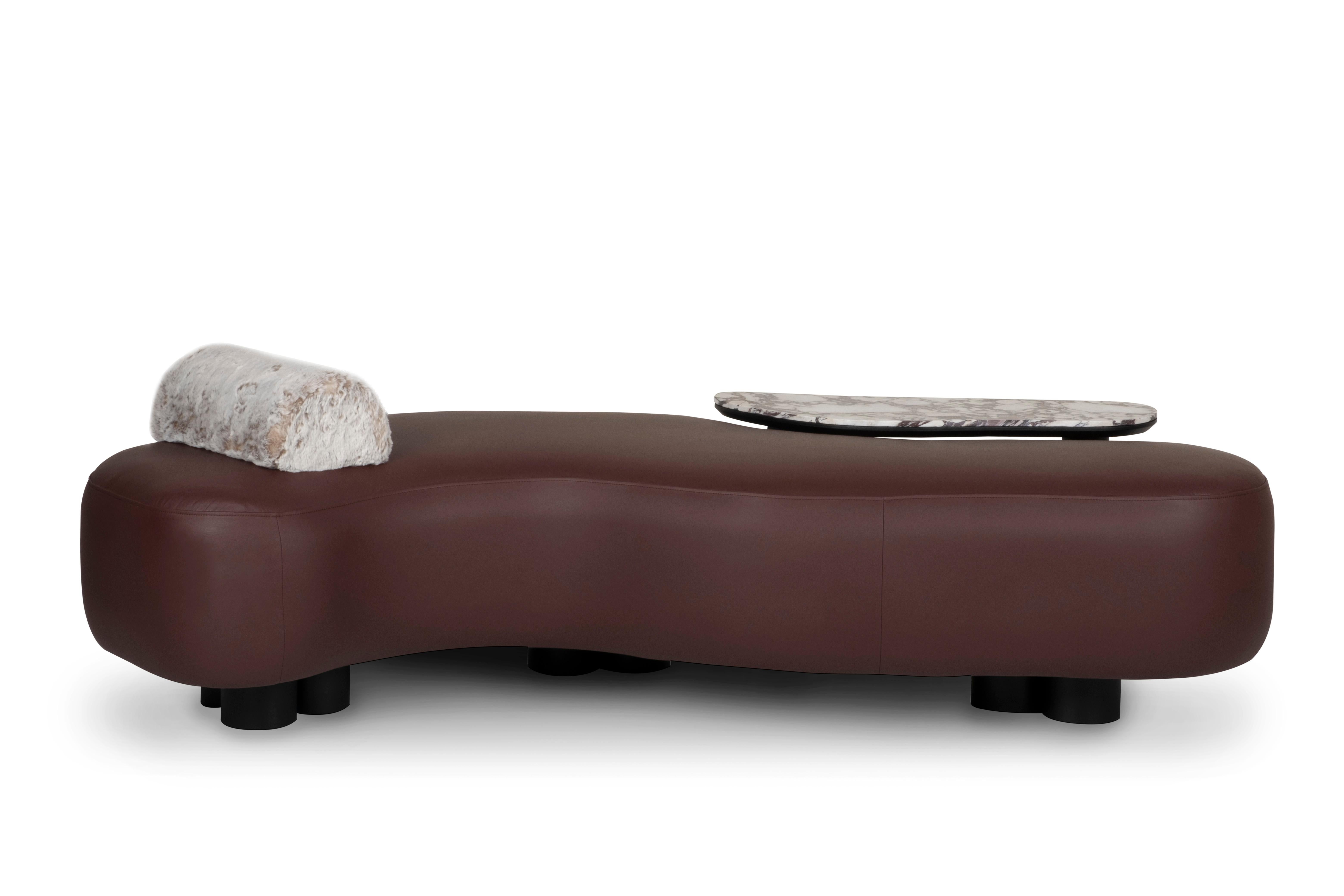Minho Chaise Longue, Contemporary Collection, Handcrafted in Portugal - Europe by Greenapple.

Designed by Rute Martins for the Contemporary Collection, the Minho leather chaise lounge with a wooden side table is a modern interpretation of the