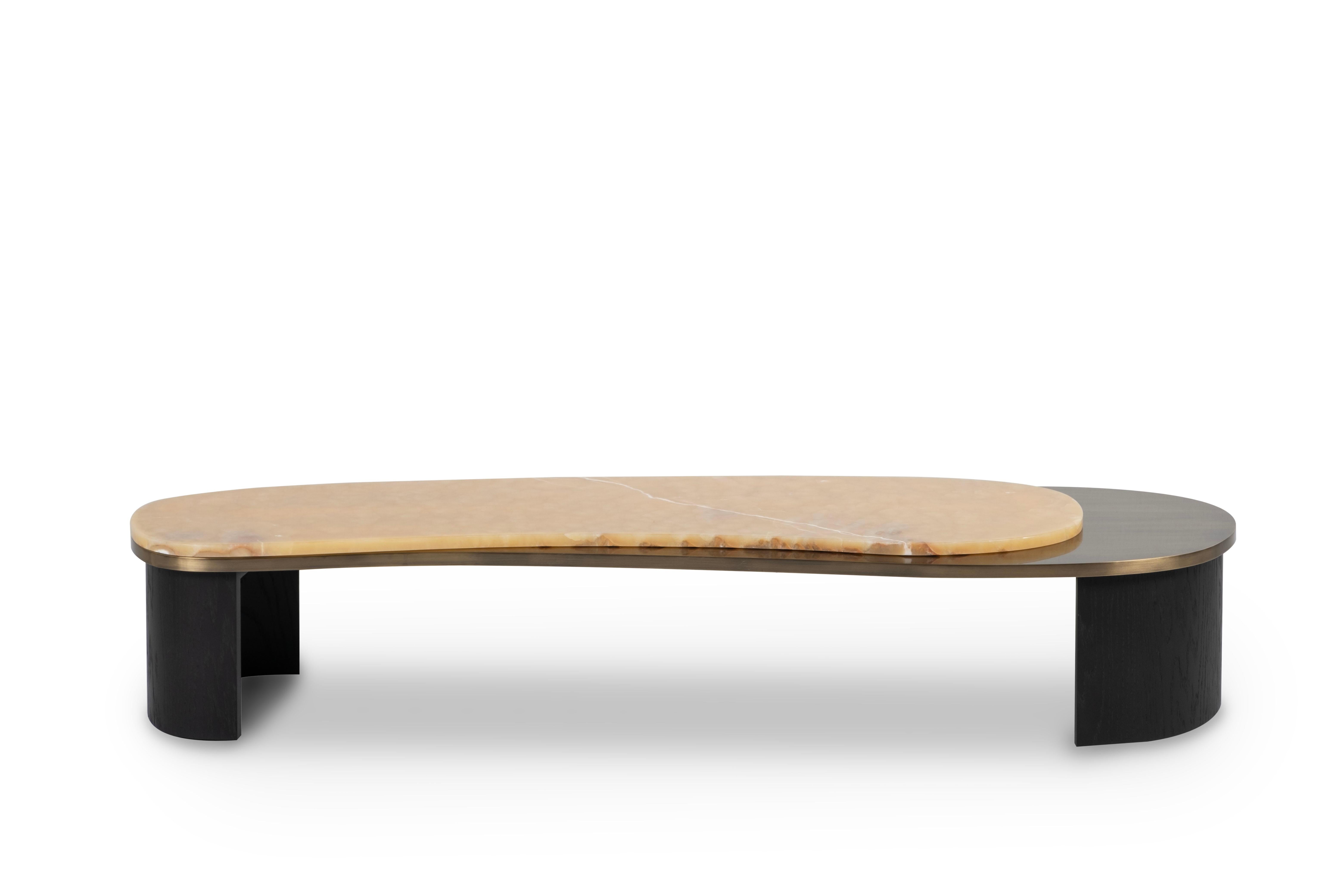 Armona coffee table, Contemporary Collection, handcrafted in Portugal - Europe by Greenapple.

Designed by Rute Martins for the Contemporary Collection, the Armona modern coffee table pays homage to the natural beauty and organic lines of Armona