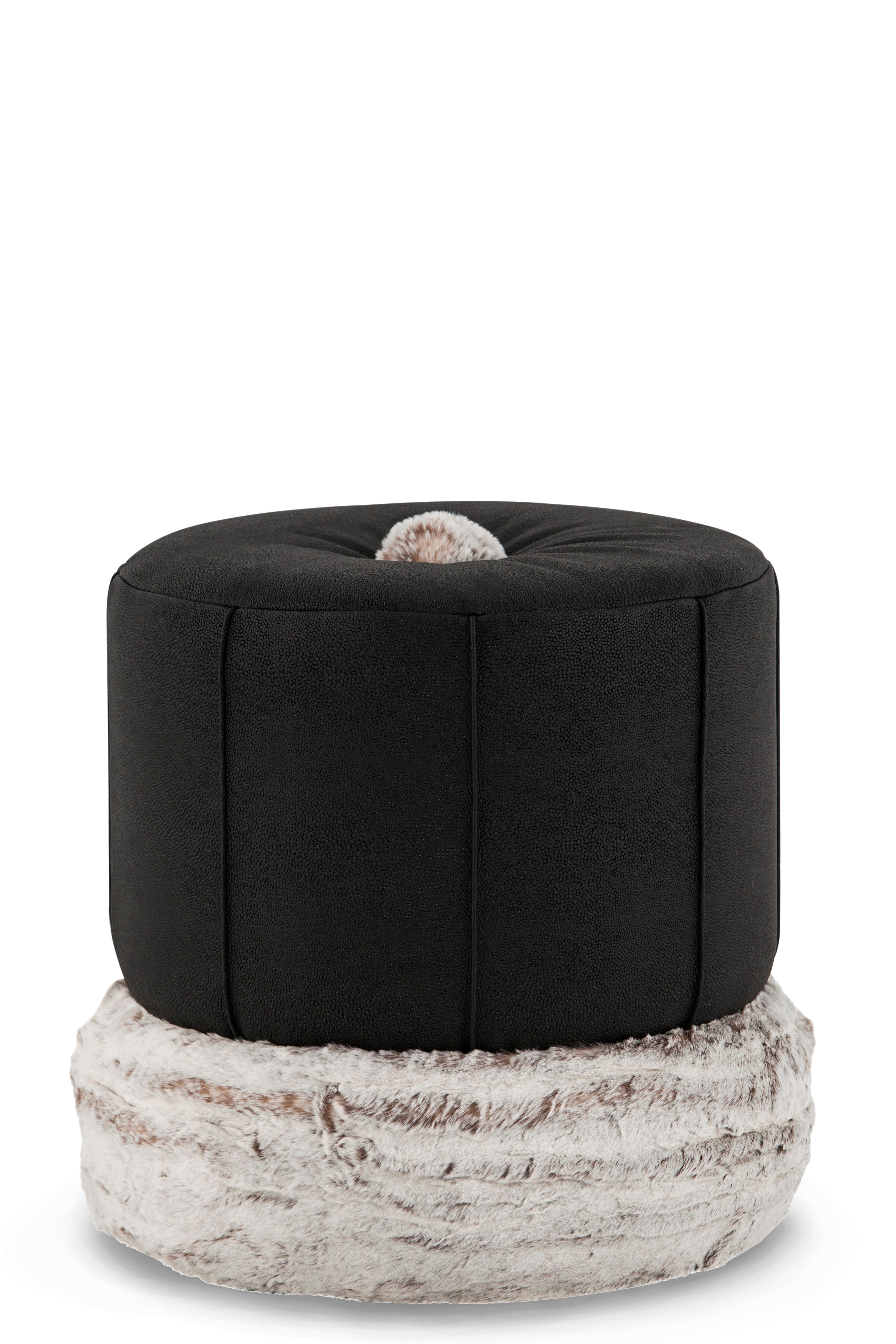 Adonis Pouf, Modern Collection, Handcrafted in Portugal - Europe by GF Modern.

A comfy pouf stool with a Mediterranean touch. Upholstered in black Italian leather and pearl faux fur, Adonis matches its name. Destined to beautify in any of its
