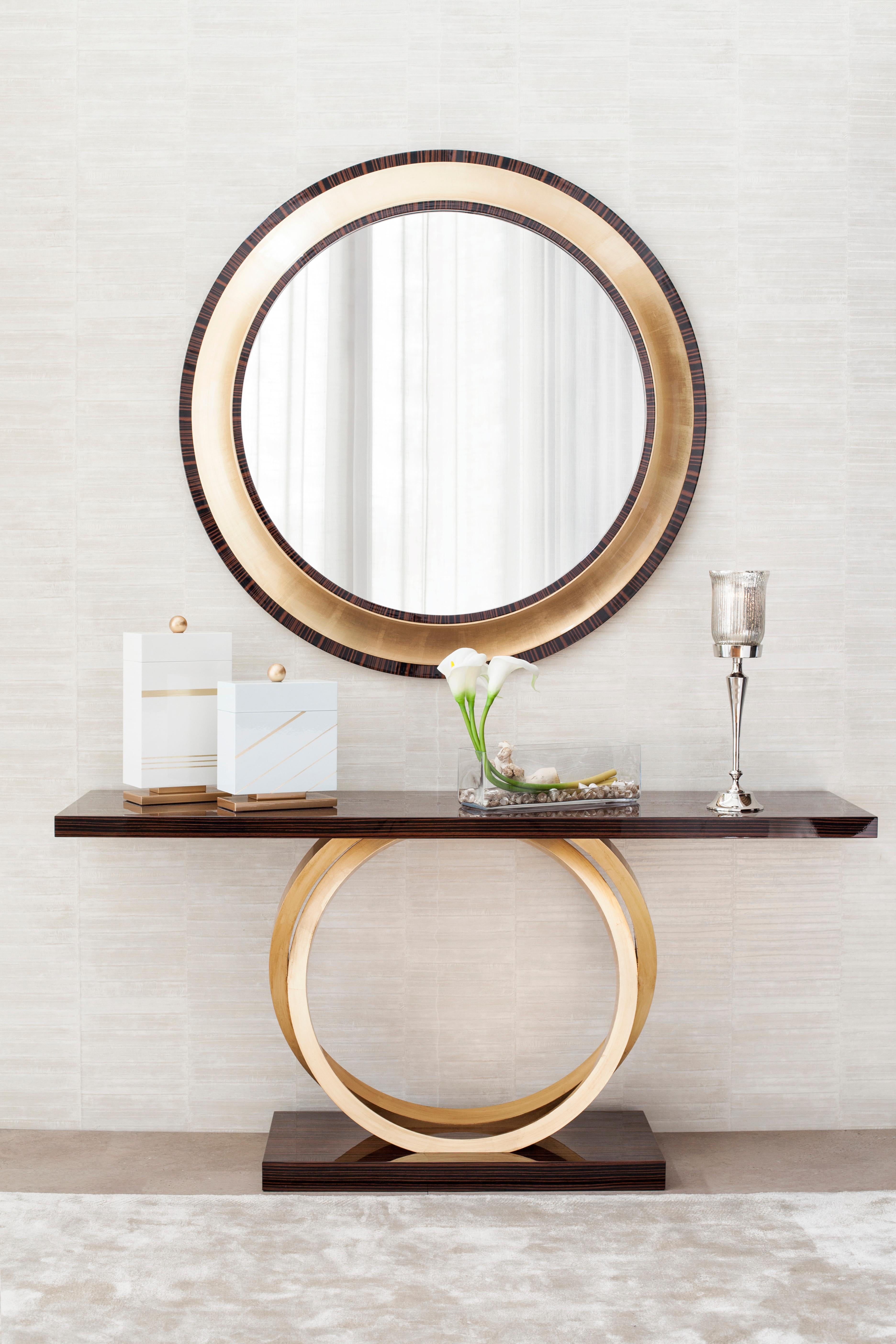 Grifo Wall Mirror, Modern Collection, Handcrafted in Portugal - Europe by GF Modern.

Grifo is a round mirror in a classical style that reflects his graceful personality. The vivid contrast between the two rings in Ebony and the central ring of