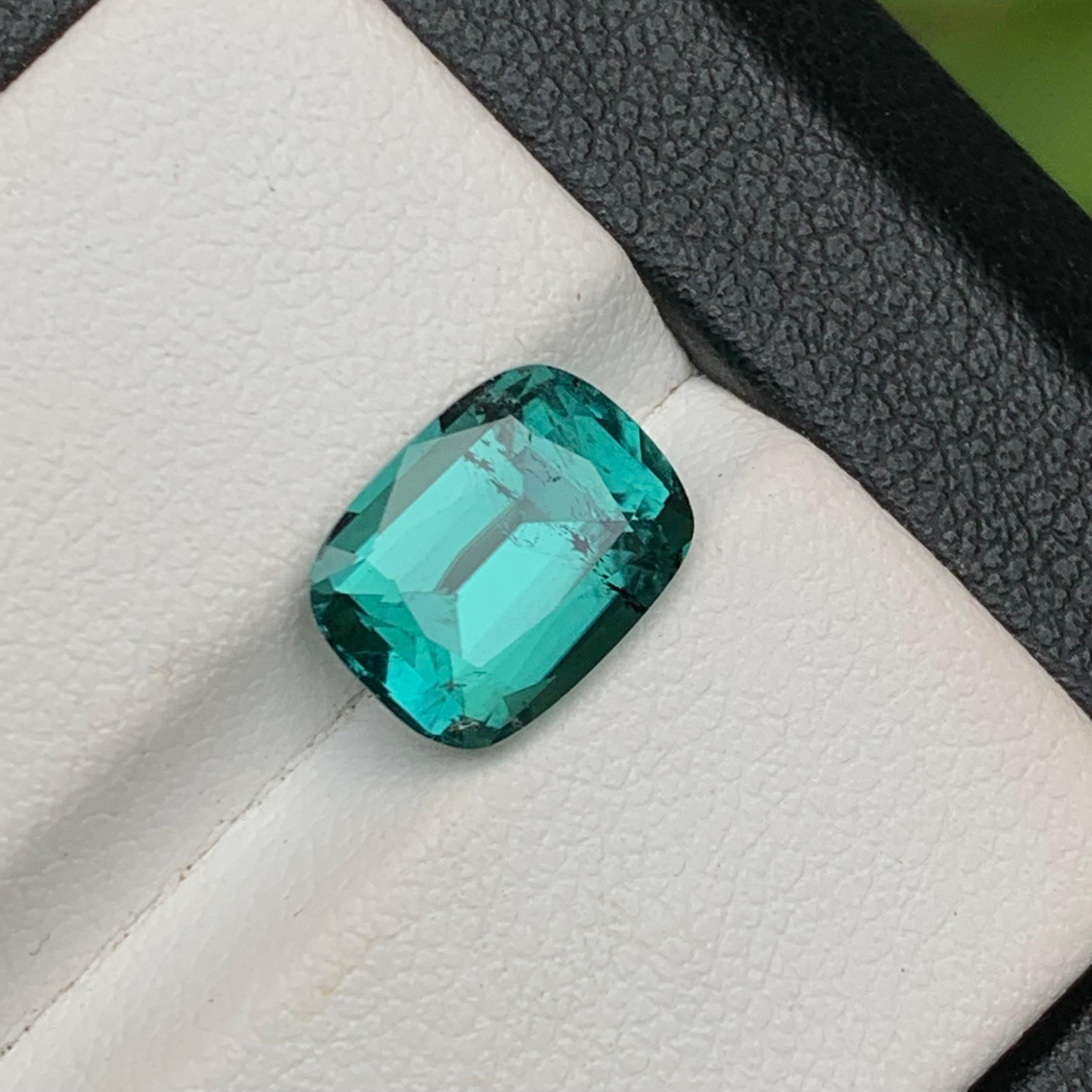 Elegant 2.95 Carat Natural Tourmaline  Greenish Blue  Cushion Cut from Kunar, Afghanistan

💎 GEMSTONE TYPE: Tourmaline 
⚖️ WEIGHT:  2.95 Carats
🪚 SHAPE & CUT: Cushion Cut
📏 SIZE (MM): 9.79 x 7.47 x 5.40
🌈 COLOR: Greenish Blue
🔎 CLARITY: