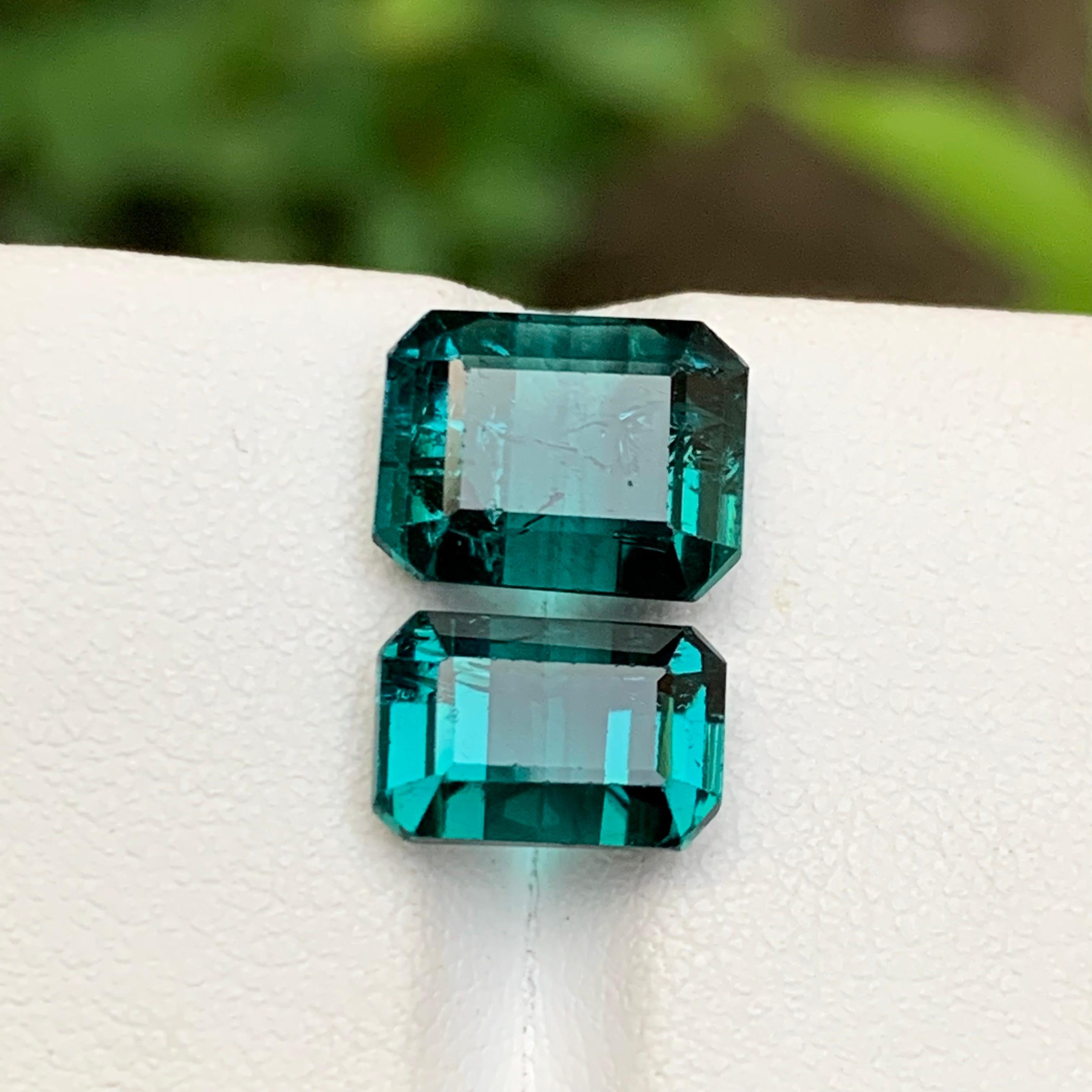 💎 GEMSTONE TYPE: Tourmaline
⚖️ WEIGHT: 8.75 Carats
🪚 SHAPE & CUT: Emerald Cut
📏 SIZE (MM): 4.95 Carat (8.22 x 10.49 x 6.36 mm) / 3.80 Carat (6.51 x 9.86 x 6.55 mm)
🌈 COLOR: Greenish Hue Blue
🔎 CLARITY: Slightly Included 
🧪 TREATMENT: None