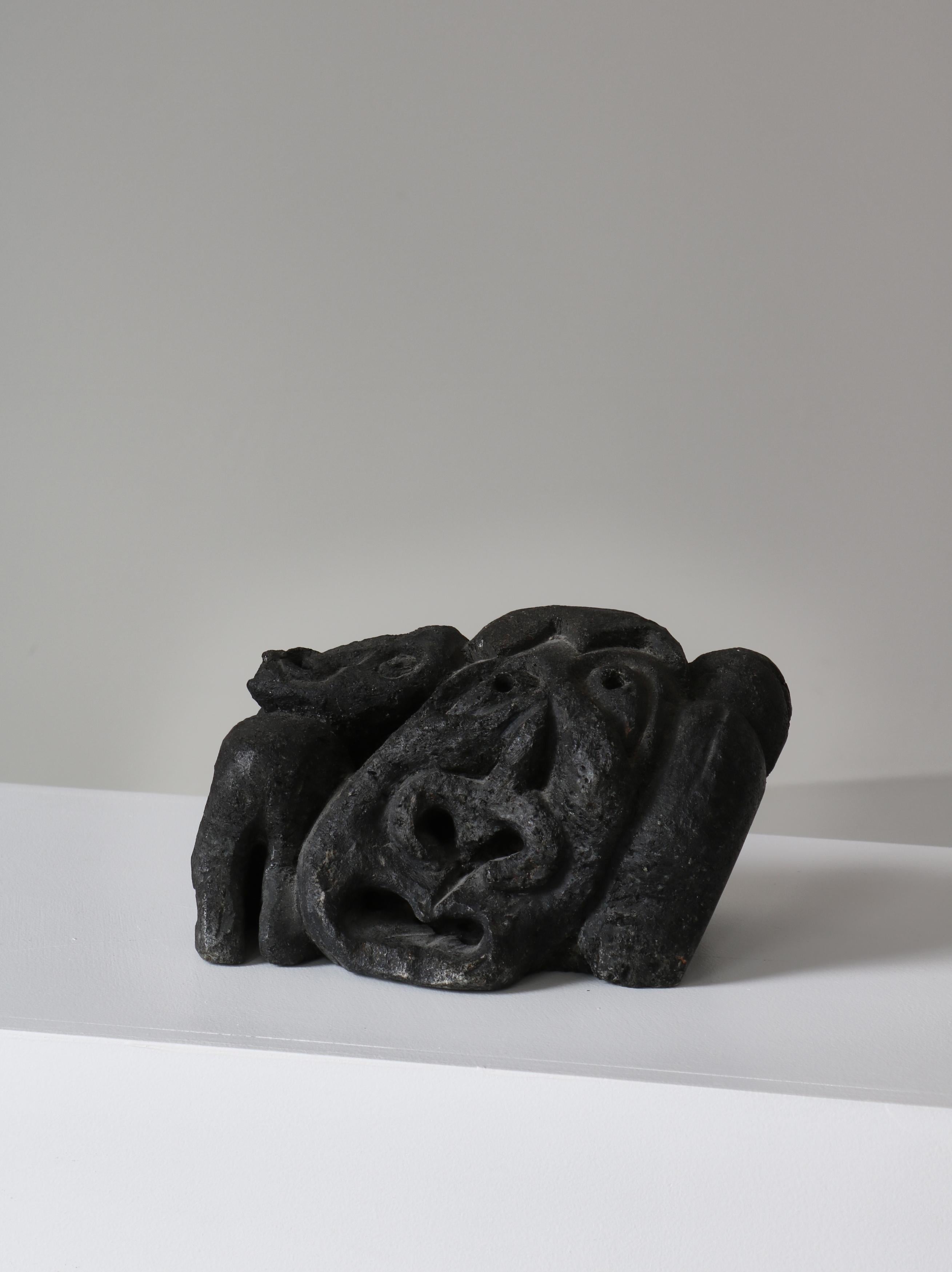 Large and wonderful Inuit ´Tupilak´ figure made in Greenland in the 20th century. The figure is cut by an unknown Inuit artist in soap stone. Tupilaks are often ground and carved based on inspiration from a number of other figures from Inuit