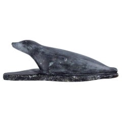 Used Greenlandica, Ortôrak, large sculpture of a lying seal made of soapstone. 