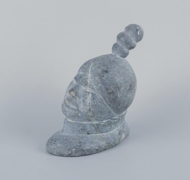 Greenlandica, Sarak, Greenlandic woman in profile, sculpture in soapstone.
1970/80s.
In excellent condition.
Signed.
Dimensions: H 14.0 cm x L 12.0 cm x W 6.0 cm.
Soapstone - also known as Steatite - is a metamorphic rock that consists primarily of