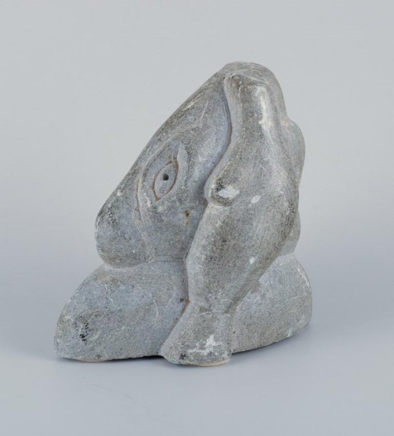 Greenlandica, Taki Petersen.
Heavy and massive sculpture in soapstone depicting a hunter and a seal.
In excellent condition.
Signed and dated 80.
Dimensions: H 15.7 cm. x L 13.5 cm.
